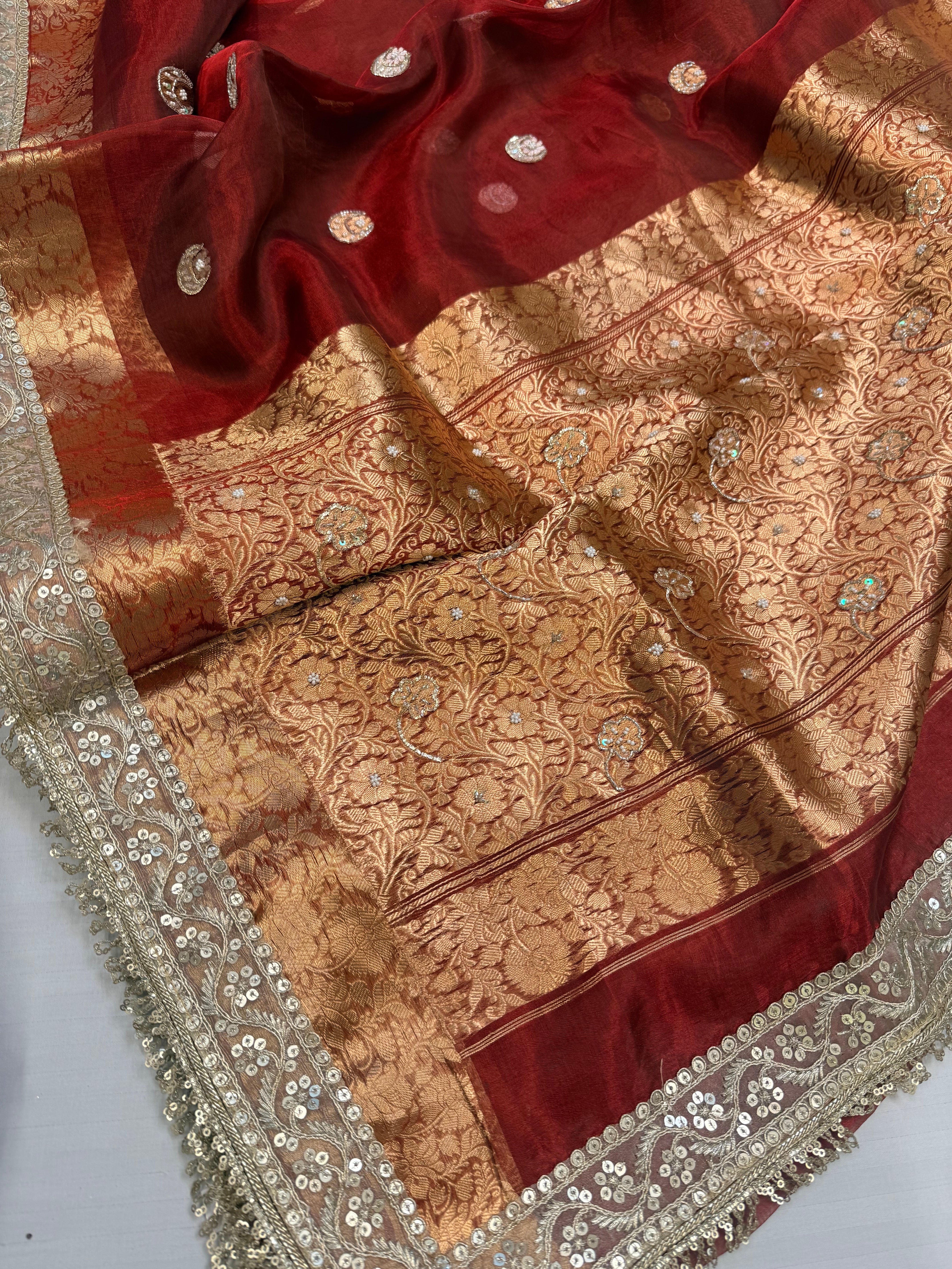 Metallic blood red chand buta tissue silk hand embroidered saree