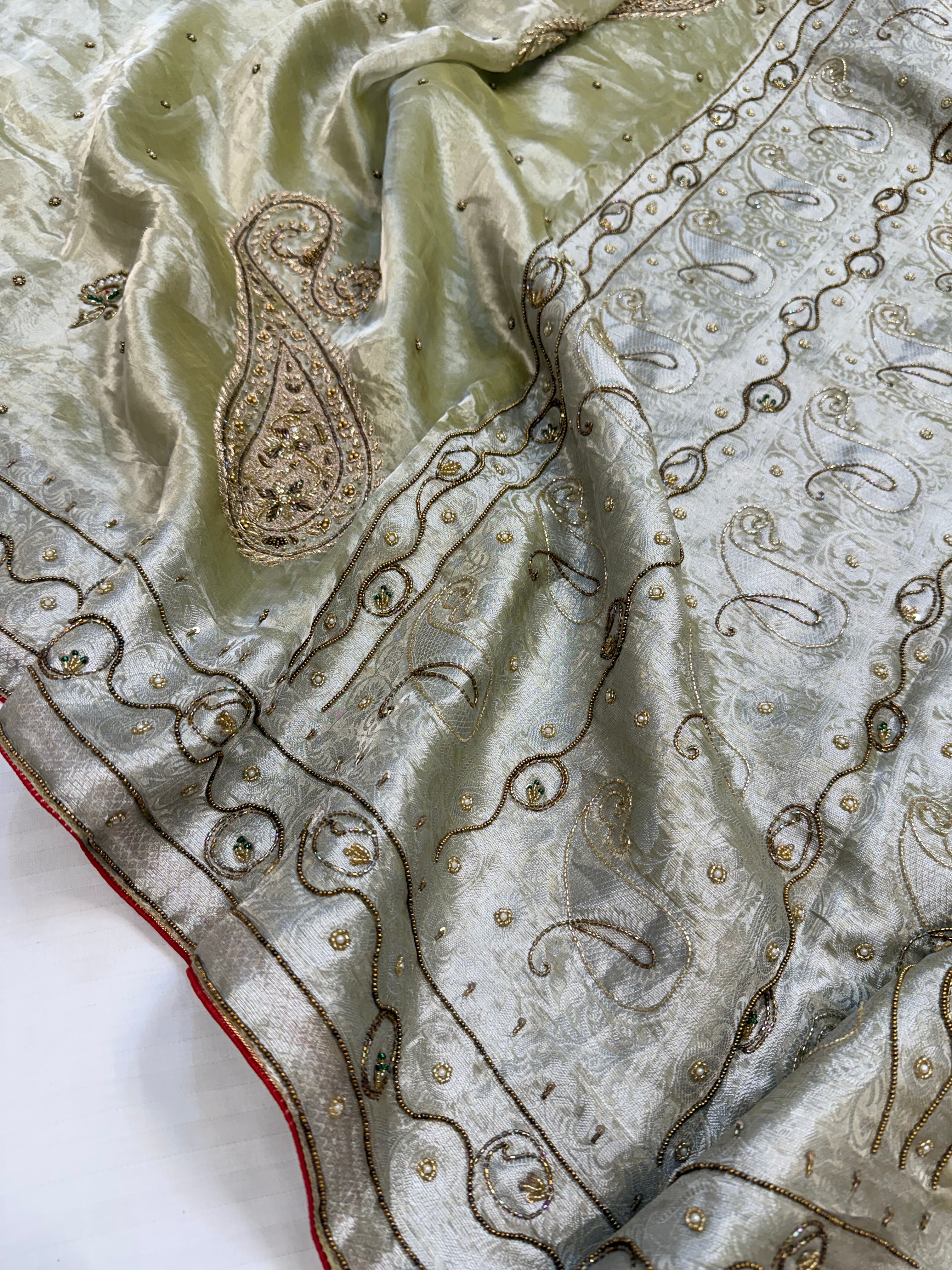 Mint green husn tissue silk meenakari hand embroidered kadhwa saree