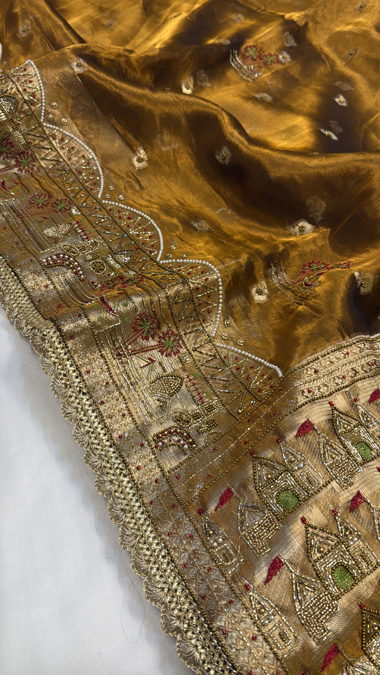 Gangakinare edit molten gold tissue silk hand embroidered saree