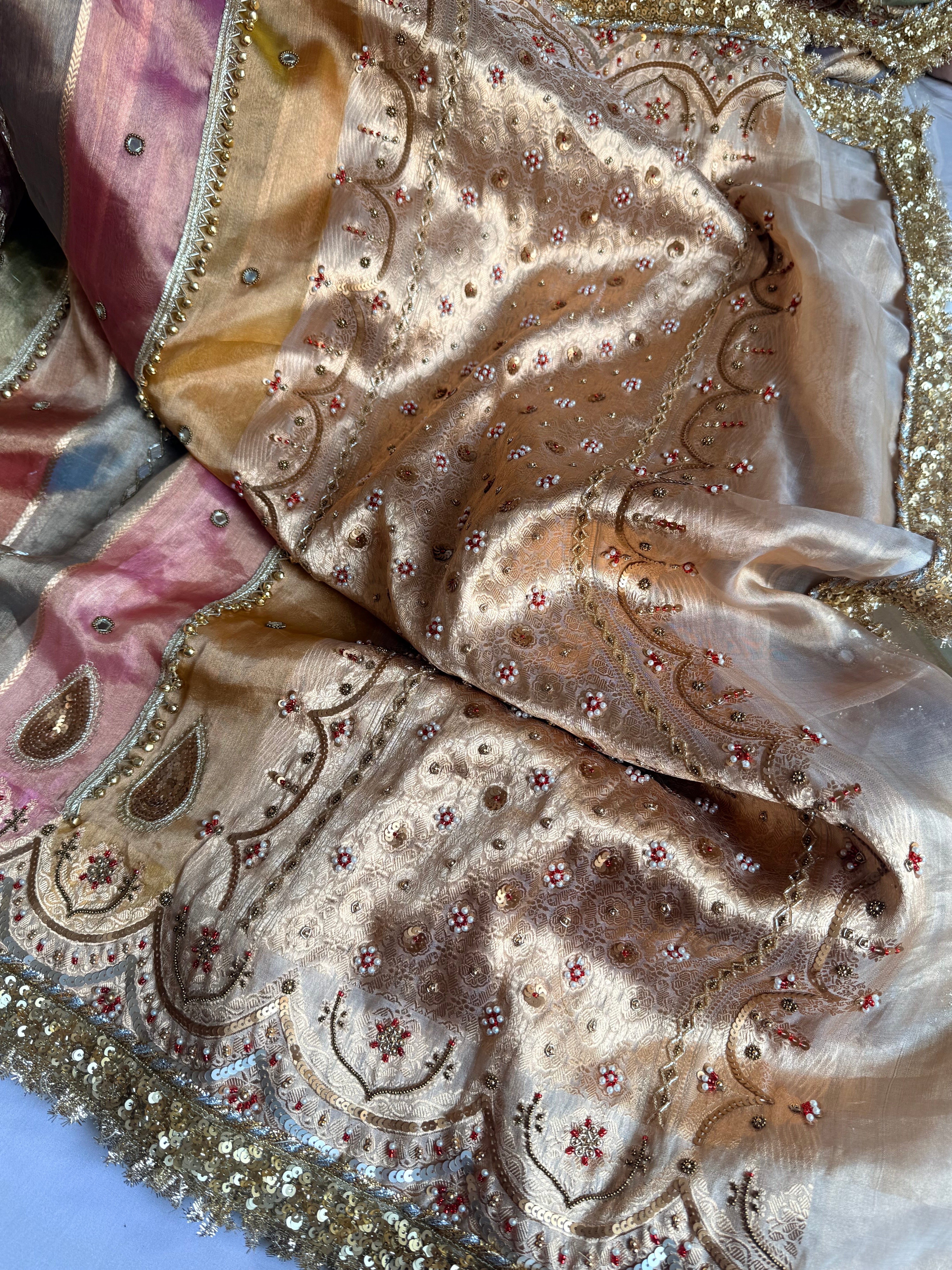Navratan edit tissue silk rangkaat and ghungroo work hand embroidered saree