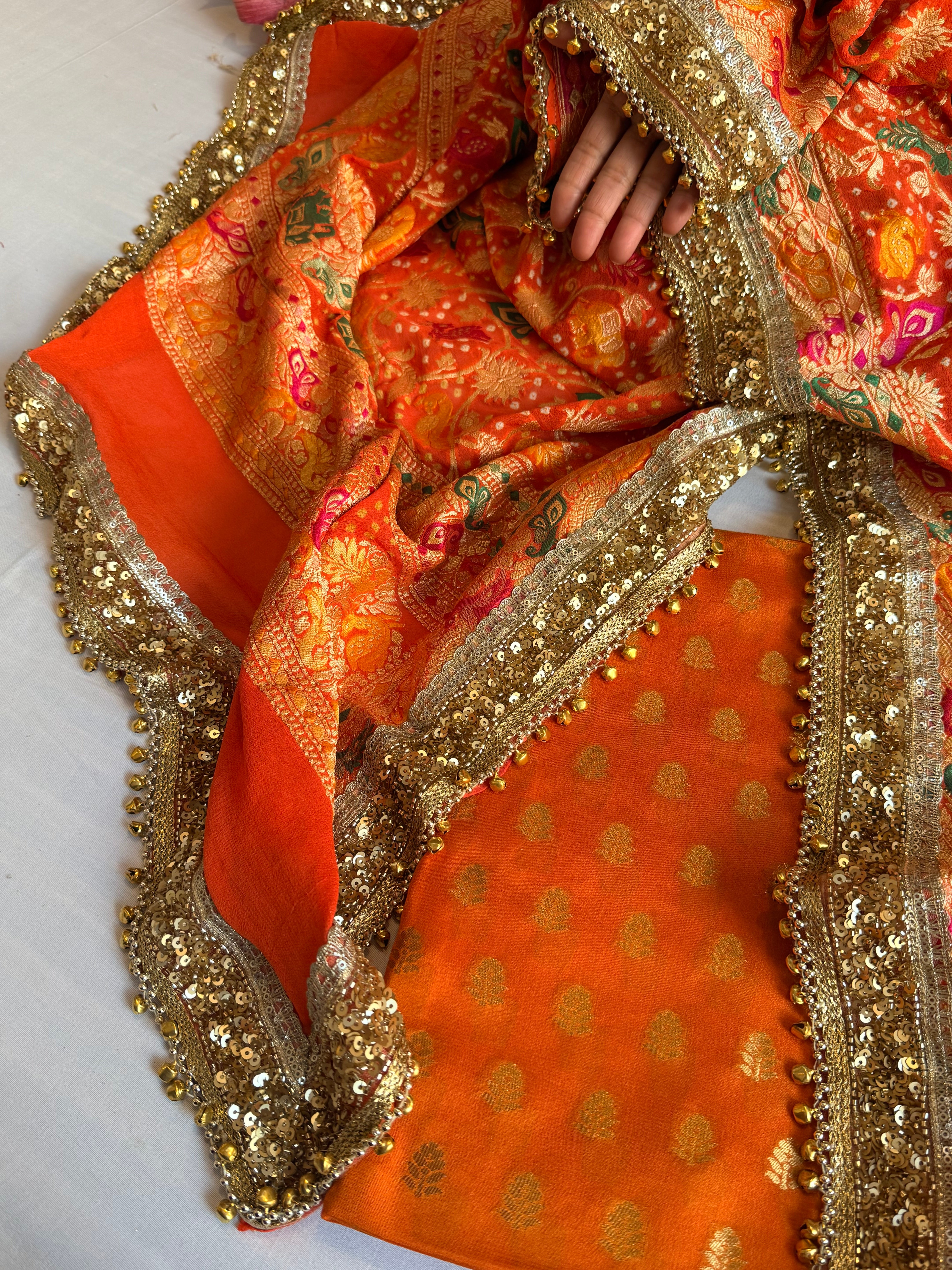 Banarasi bandhej fanta orange ghungroo and sequin work chiffon gorgette kadhwa suit set