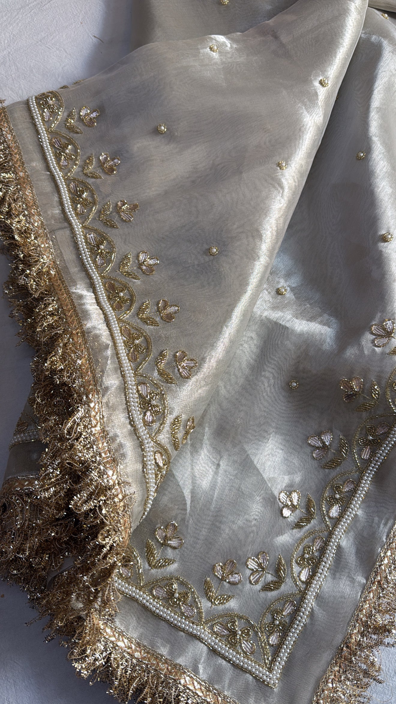 “Tara sutaria” tissue diamond tanchoi silk hand embroidered uljhi gotapatti saree