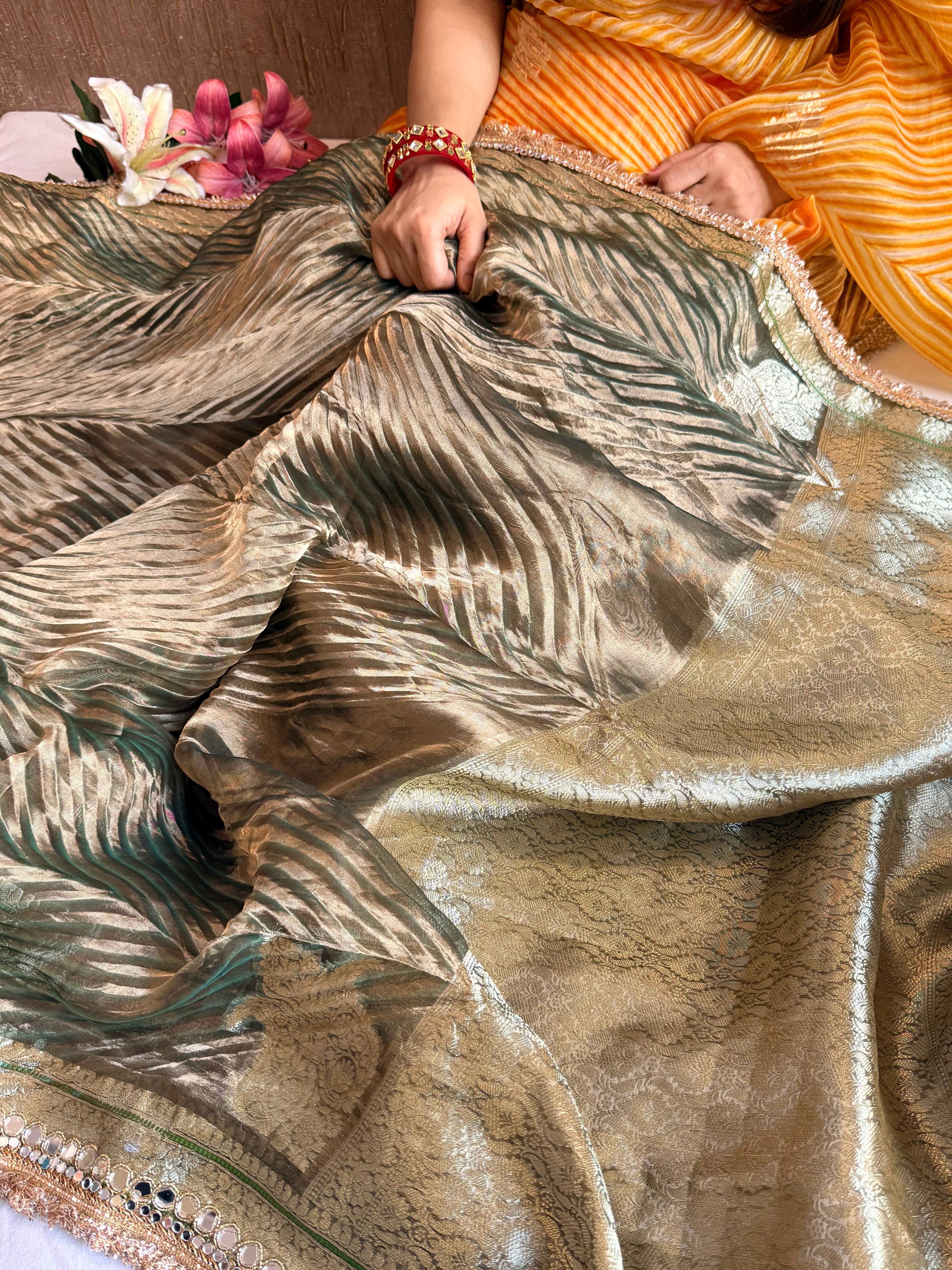 Mint green tissue silk arshi dyed mirrorwork hand embroidered kadhwa saree
