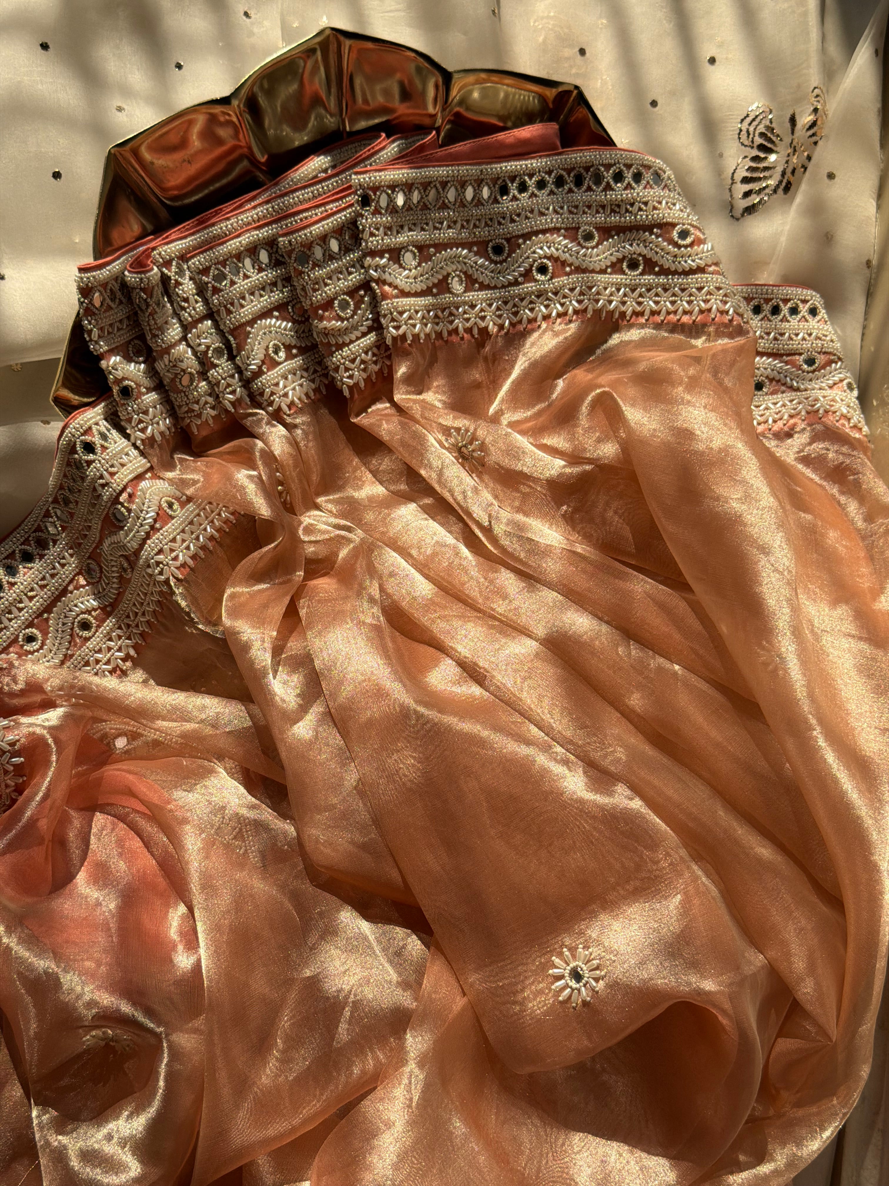 Gajri peach mirrorwork and pearlwork hand embroidered diamond tissue saree