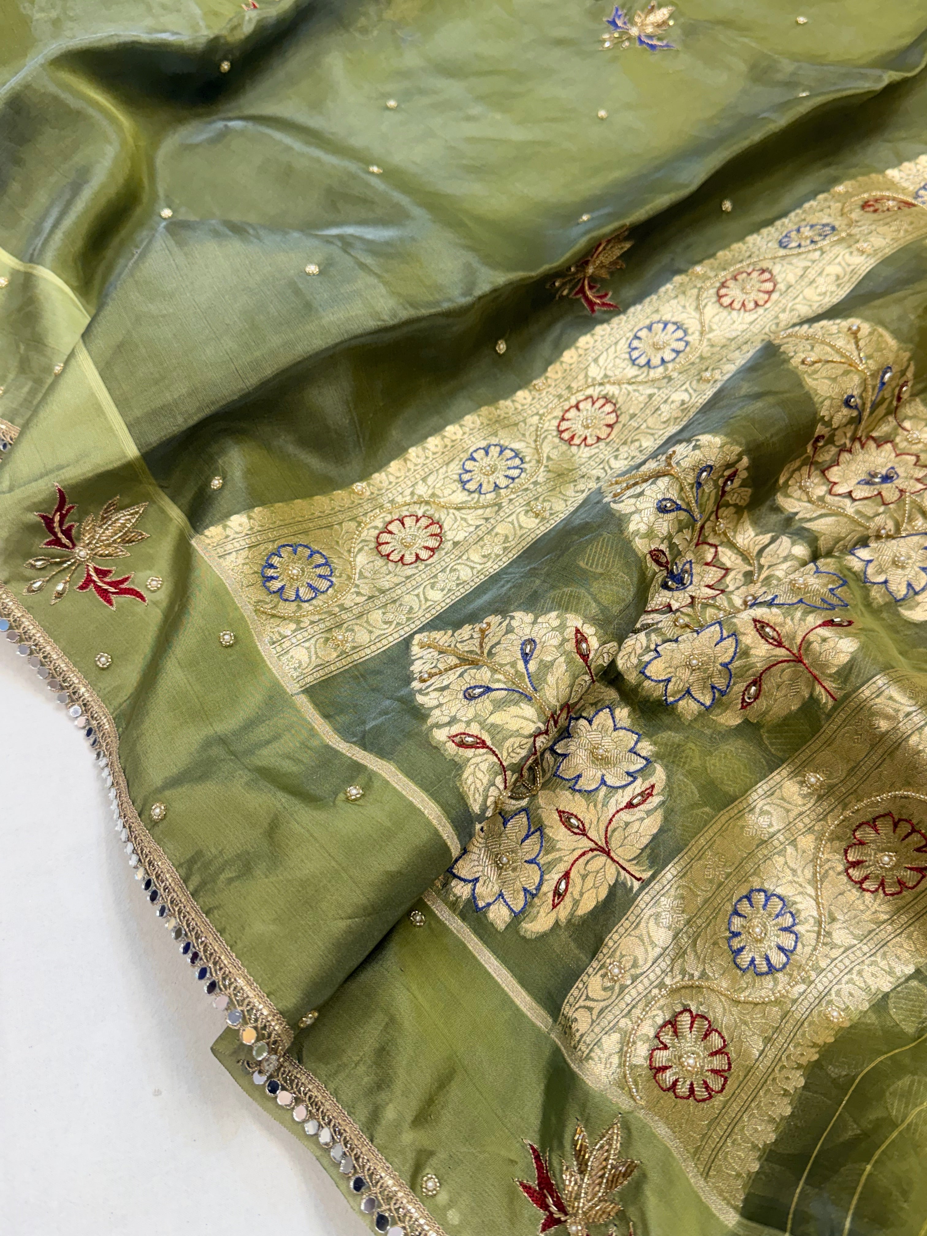 Parrot green tissue silk hand embroidered kadhwa saree