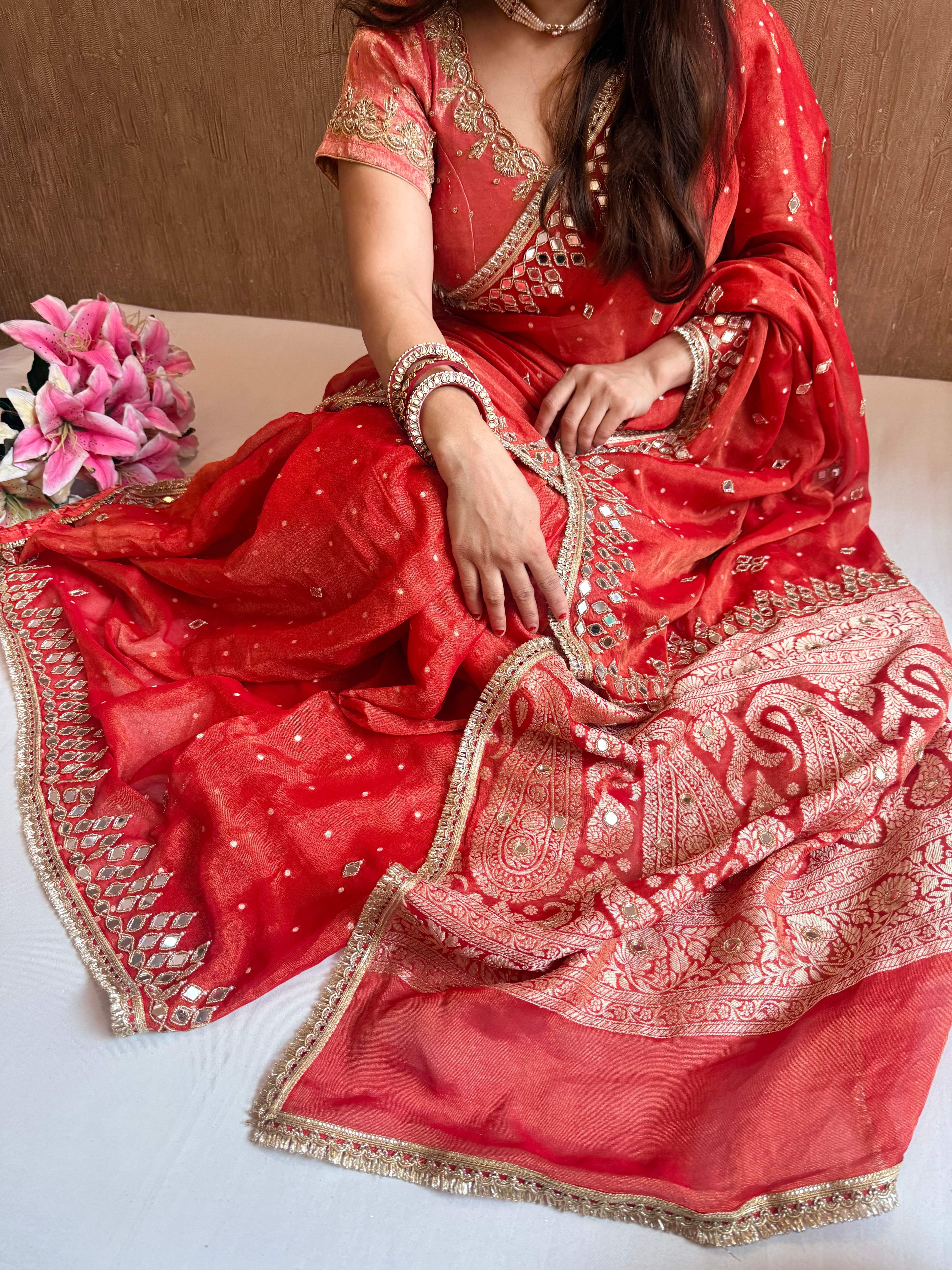 Rust red tissue gorgette mirror work hand embroidered saree
