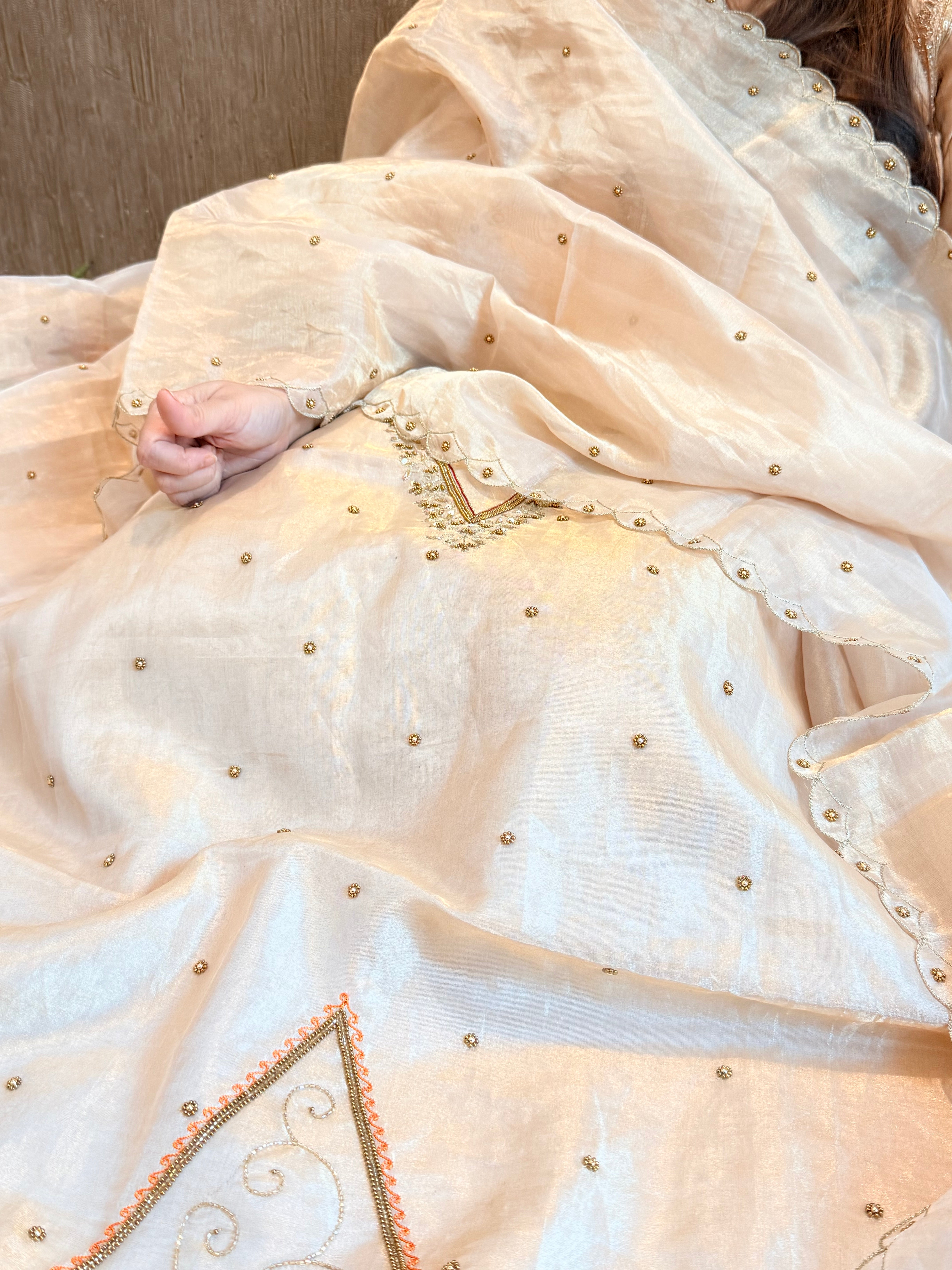 Golden tissue silk meenakari weaving hand embroidered suits
