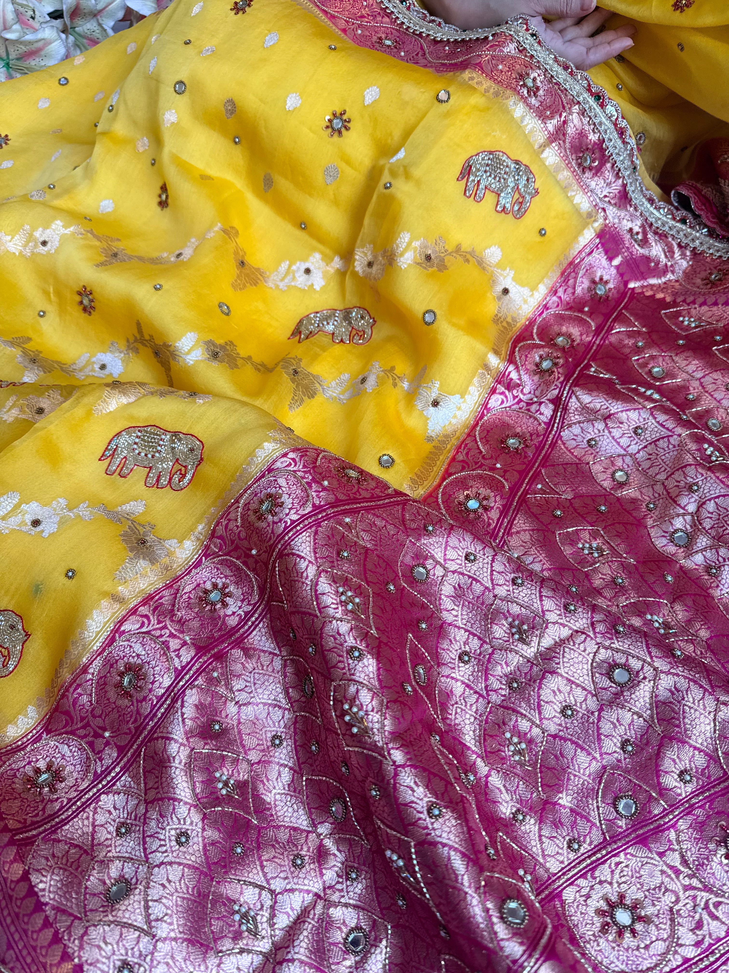 Peeli gulabi phere wali kora silk hand embroidered kadhwa saree