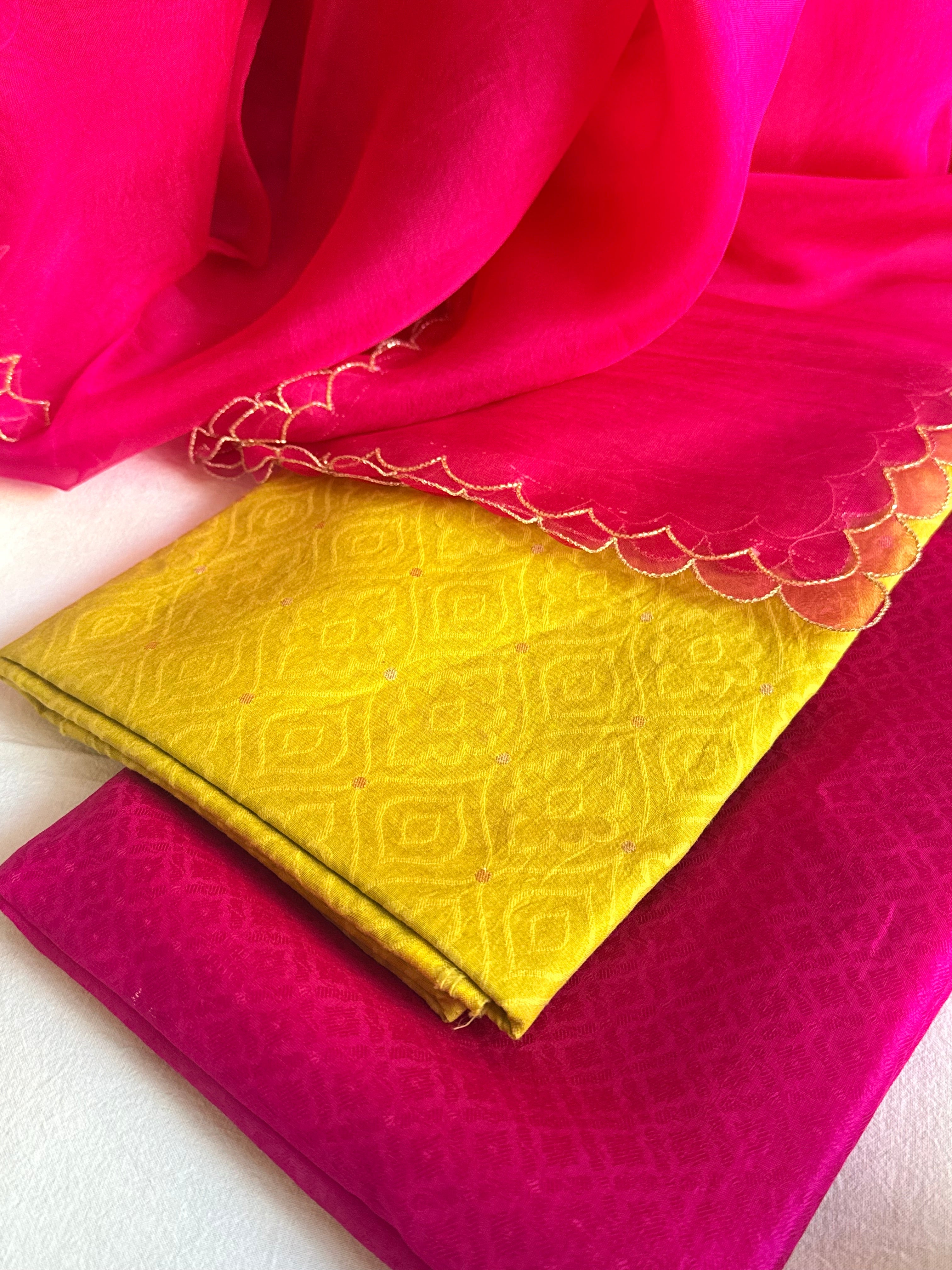 Summer suits under 8k - Mul cotton yellow kurta paired with rani scalloped kora silk duppata