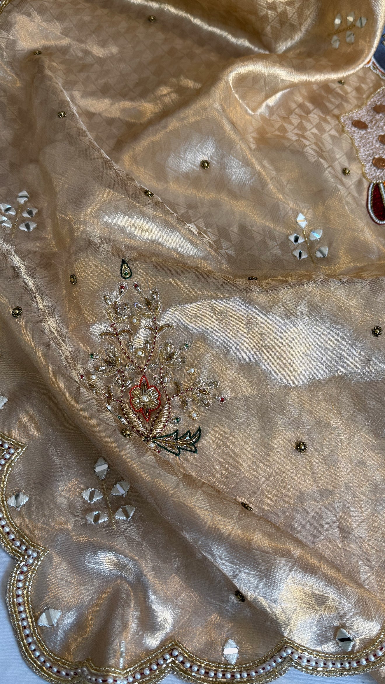 Shrinathji motif inspired molten tissue brocade kadhwa weaving hand embroidered saree