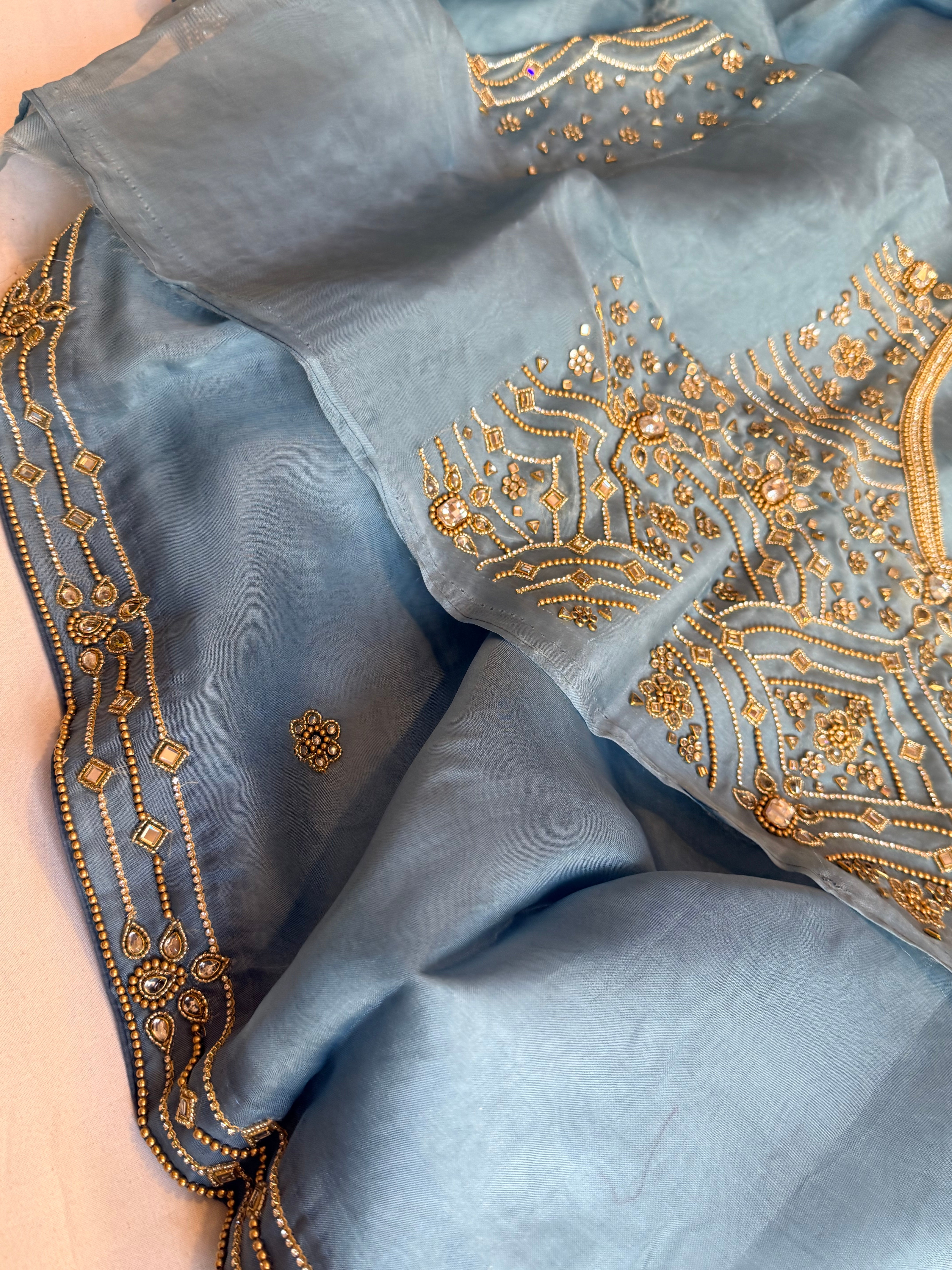 Banarasi icey blue kora silk polki hand embroidered kadhwa saree