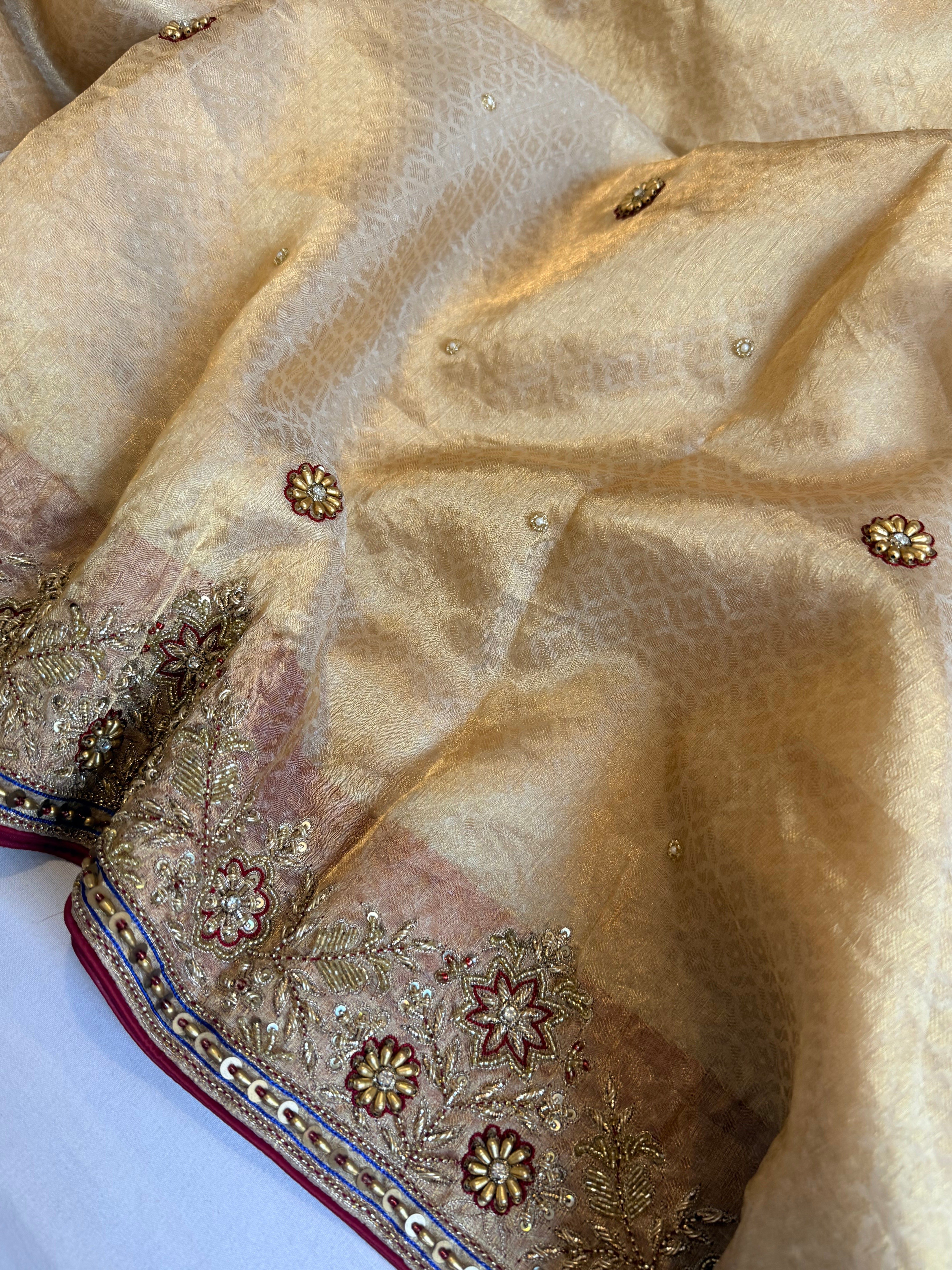 Zardozi & Jadauwork border tissue silk hand embroidered kadhwa butter gold saree