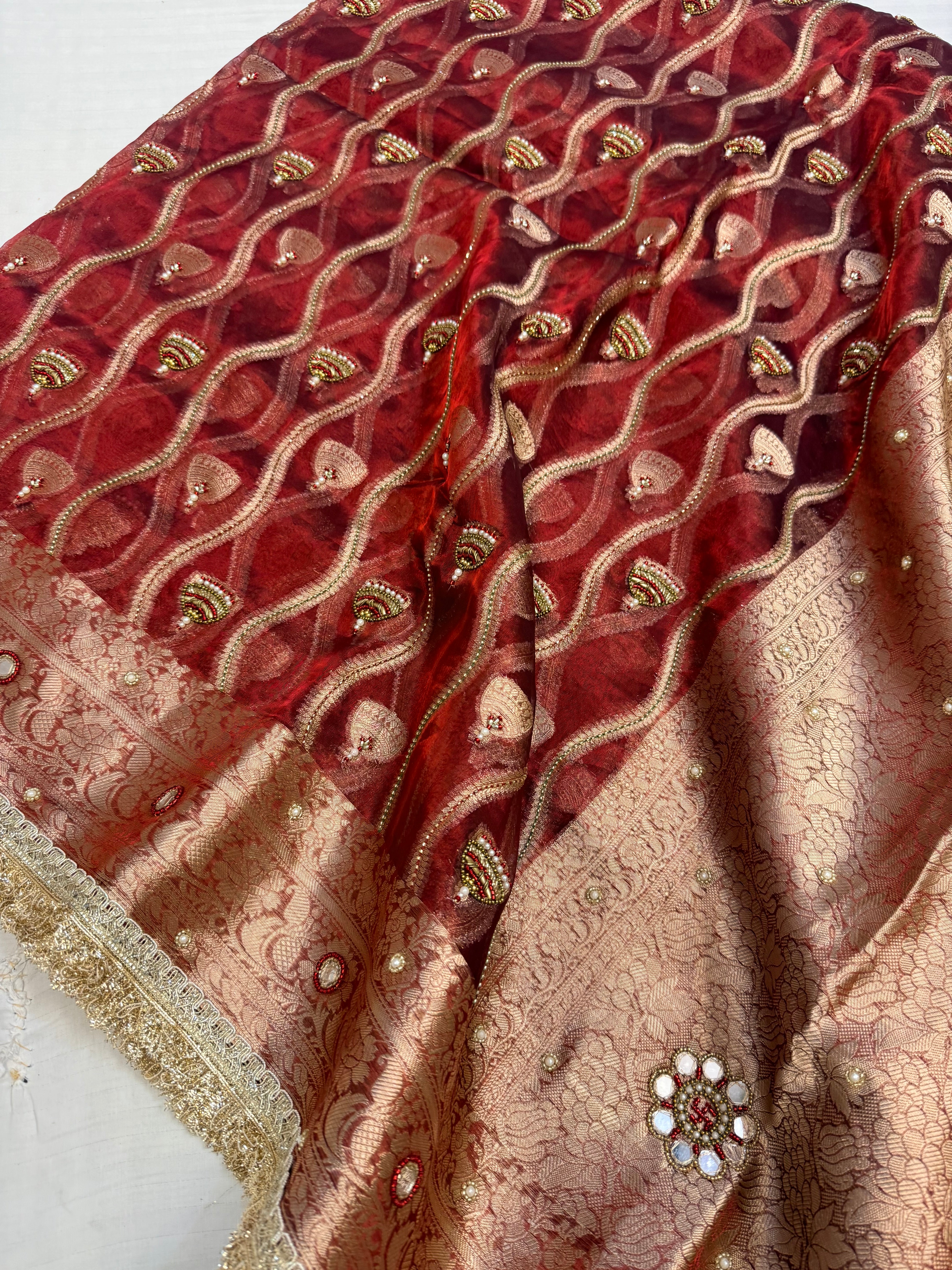 Blood metallic red husn jaalwork tissue silk hand embroidered saree