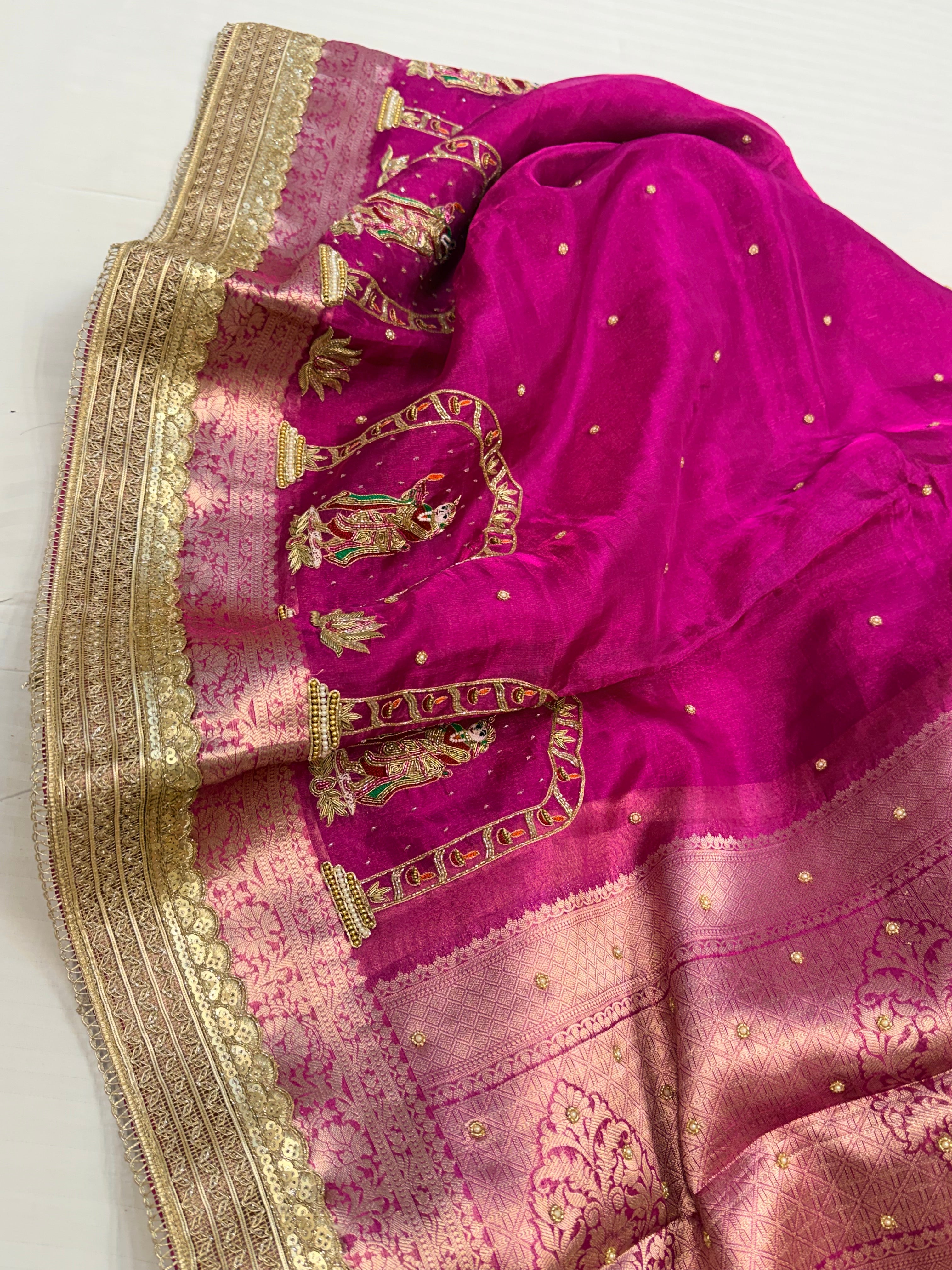 Rani pink husn tissue silk krishna motif hand embroidered saree