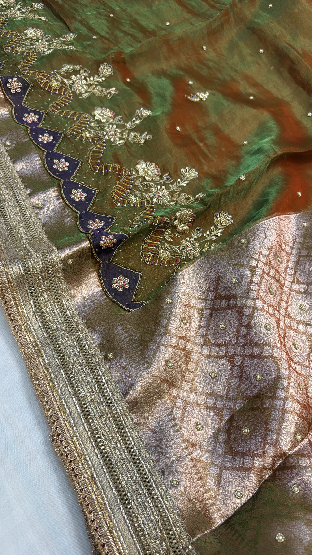 Mehendi green dhup chao effect tissue silk hand embroidered saree