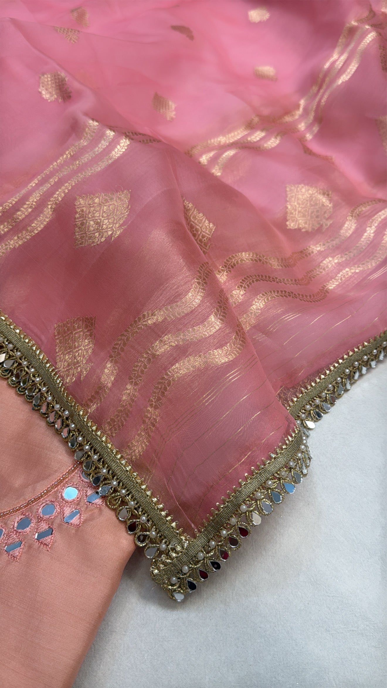 Peachy pink chiniya silk kadhwa kurta paired with kora silk kadhwa duppata