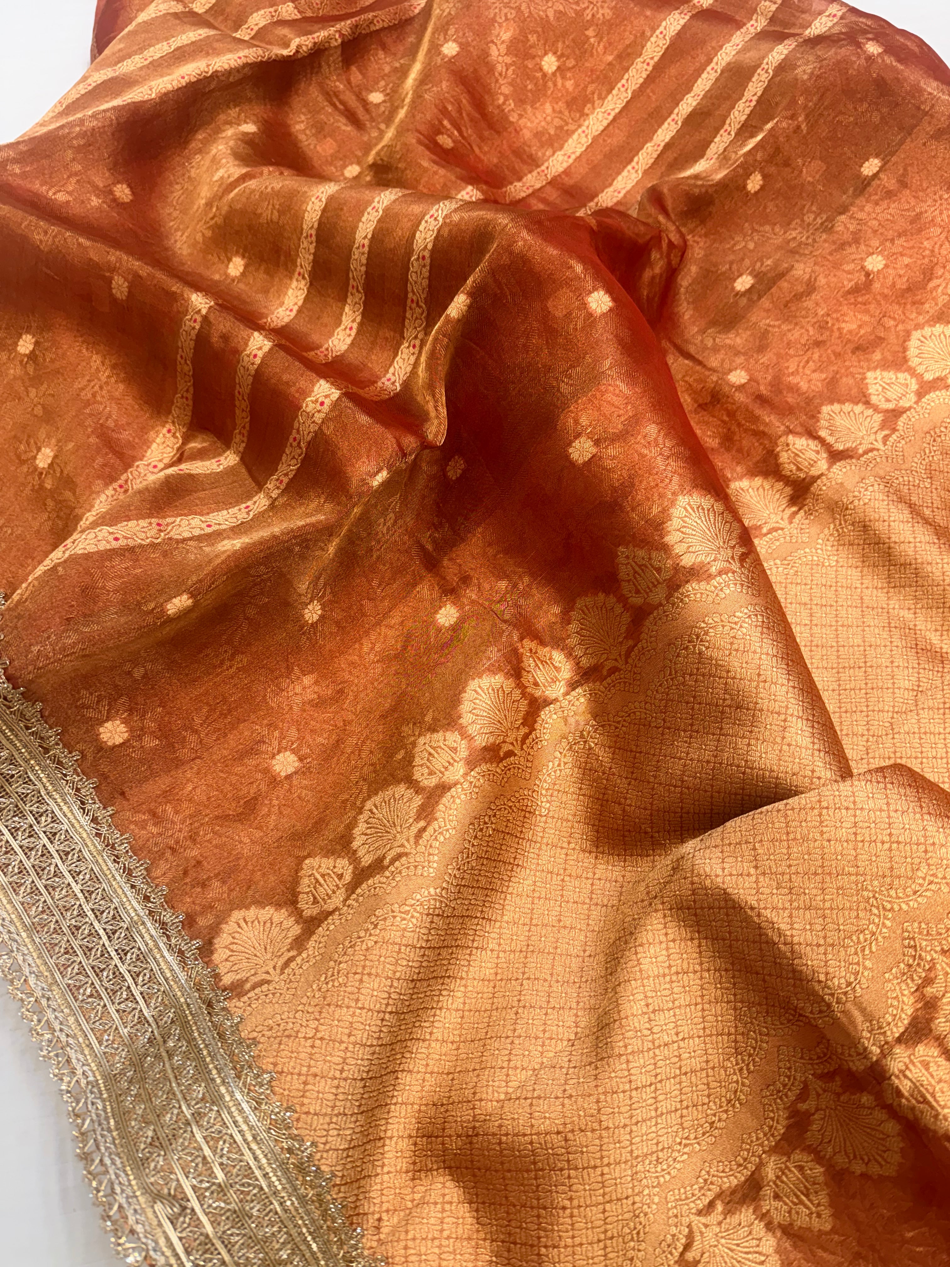 Tangerine red tissue silk kadhwa buti and striped gotapatti saree
