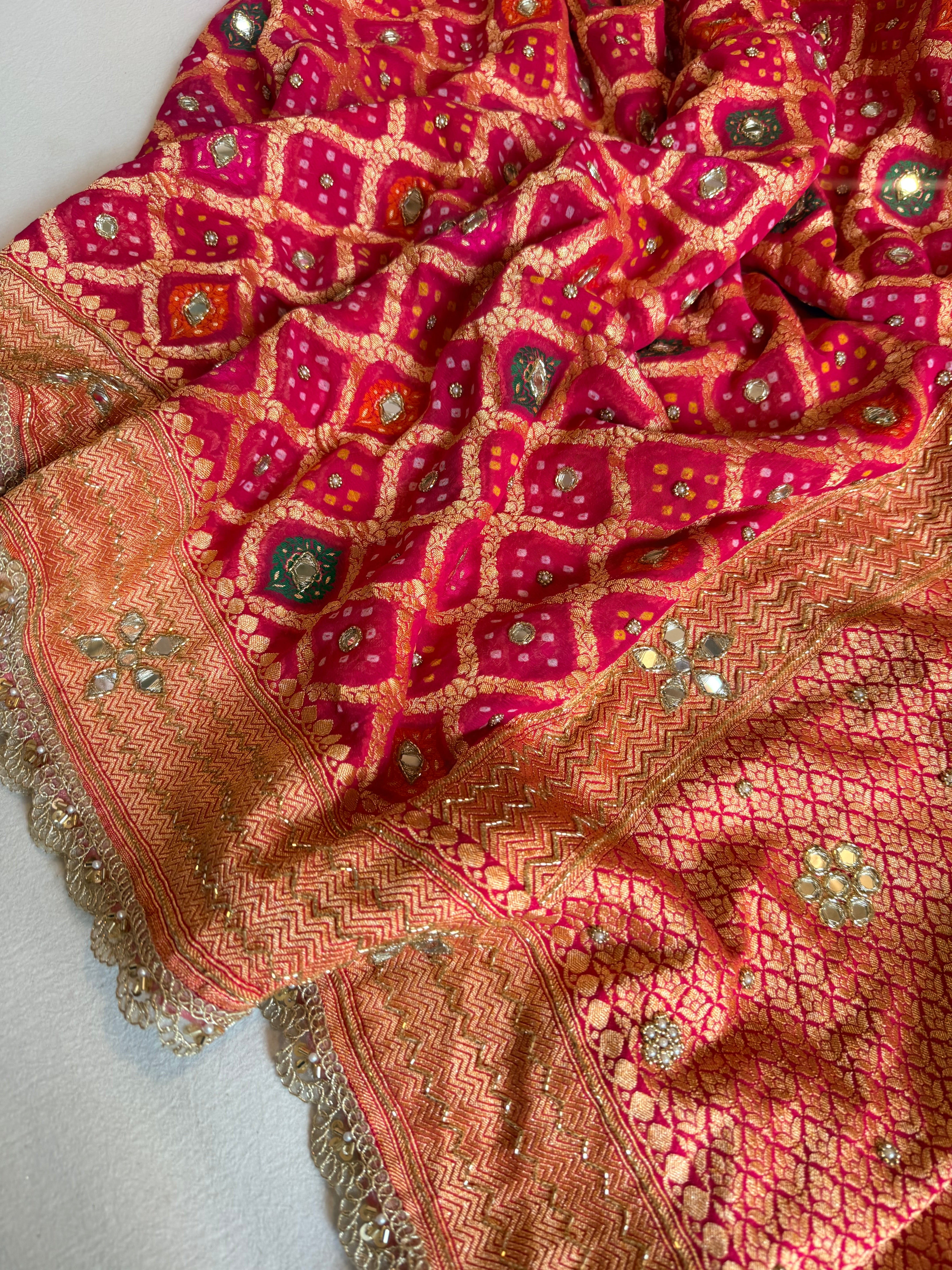 Banarasi chiffon gorgette rai bandhej kadhwa weaving hand embroidered saree
