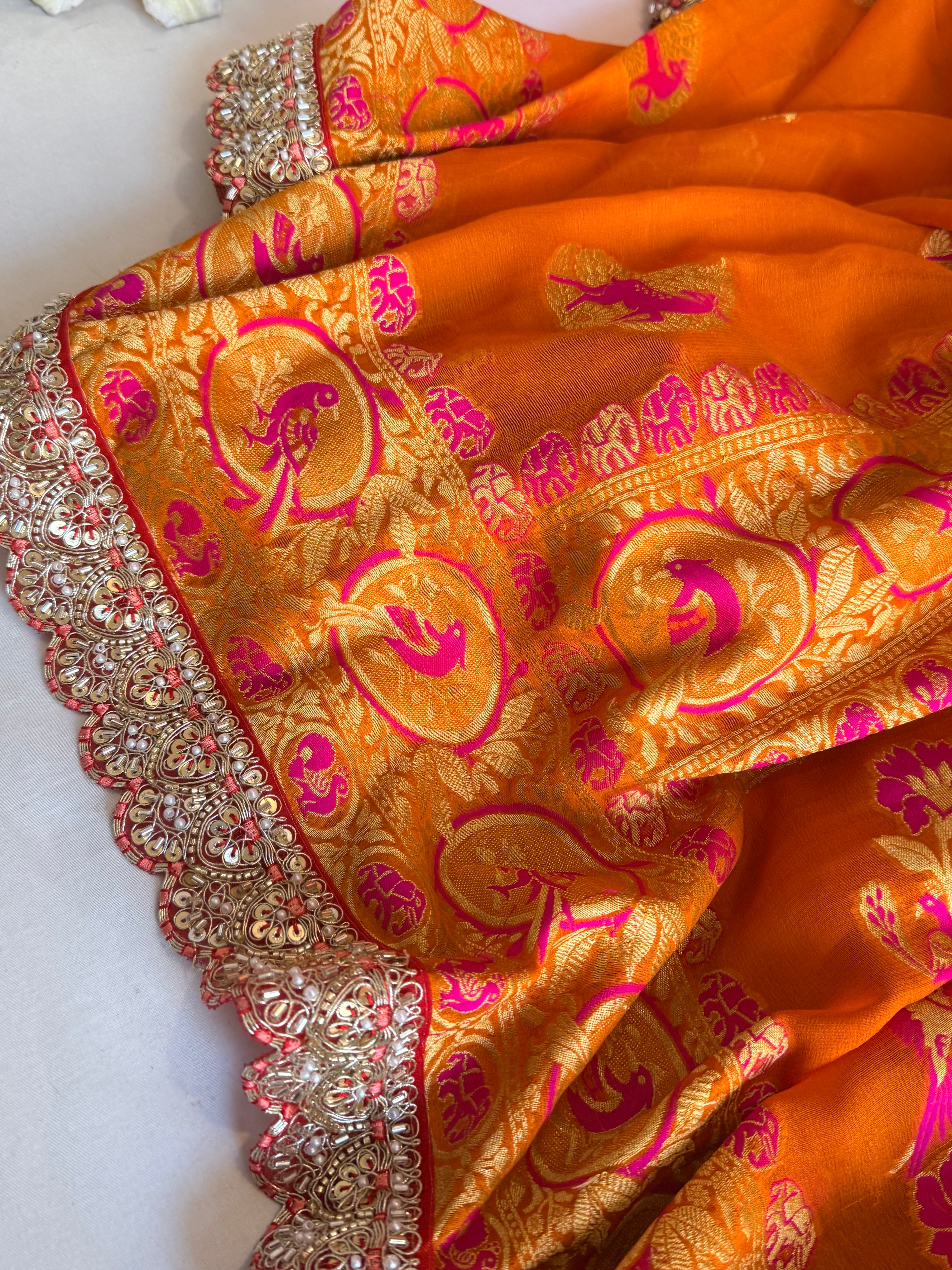 Juicy orange shikargah kadhwa border chiffon gorgette banarasi saree