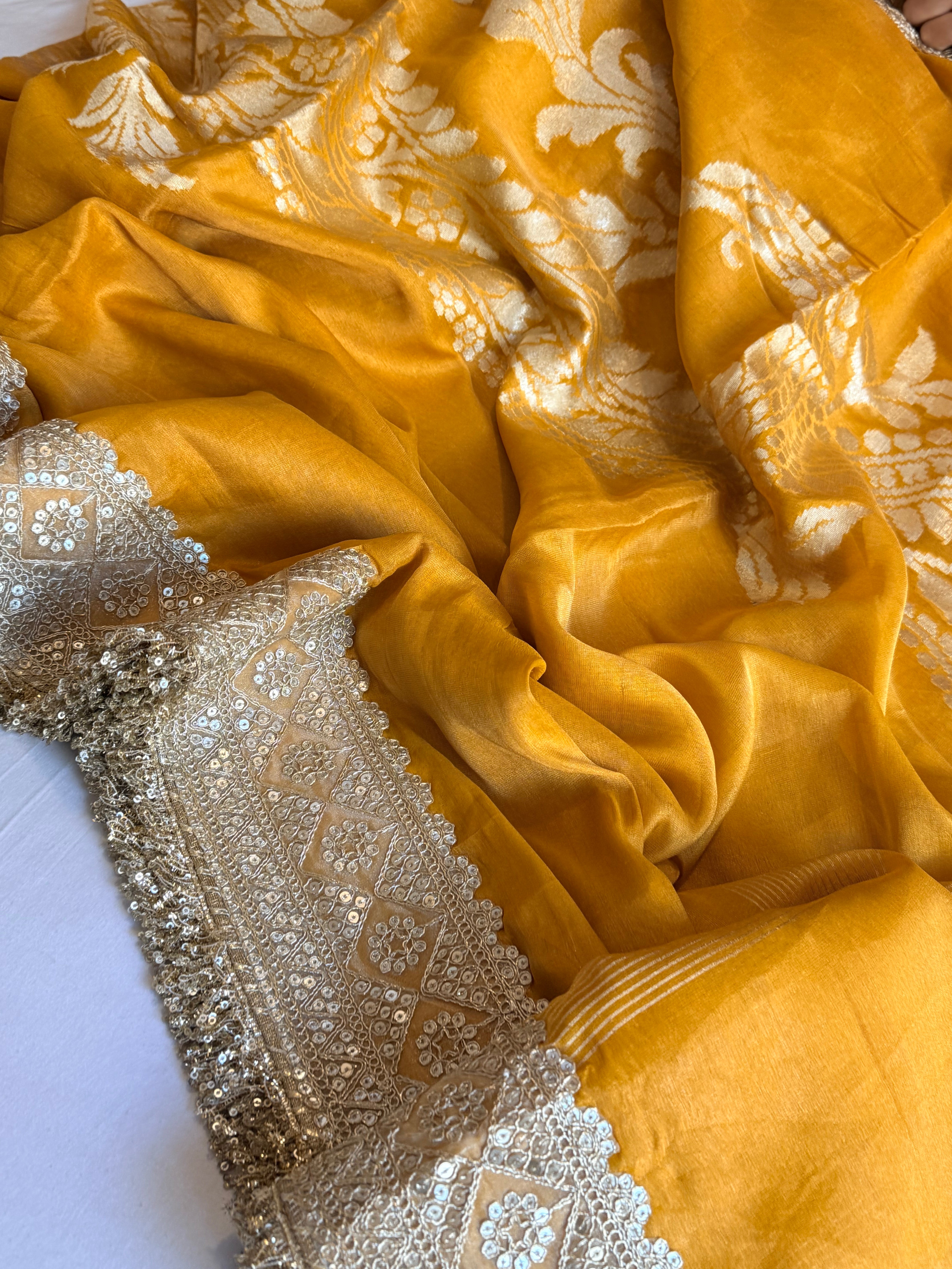Haldi yellow tissue gorgette kadhwa motif saree
