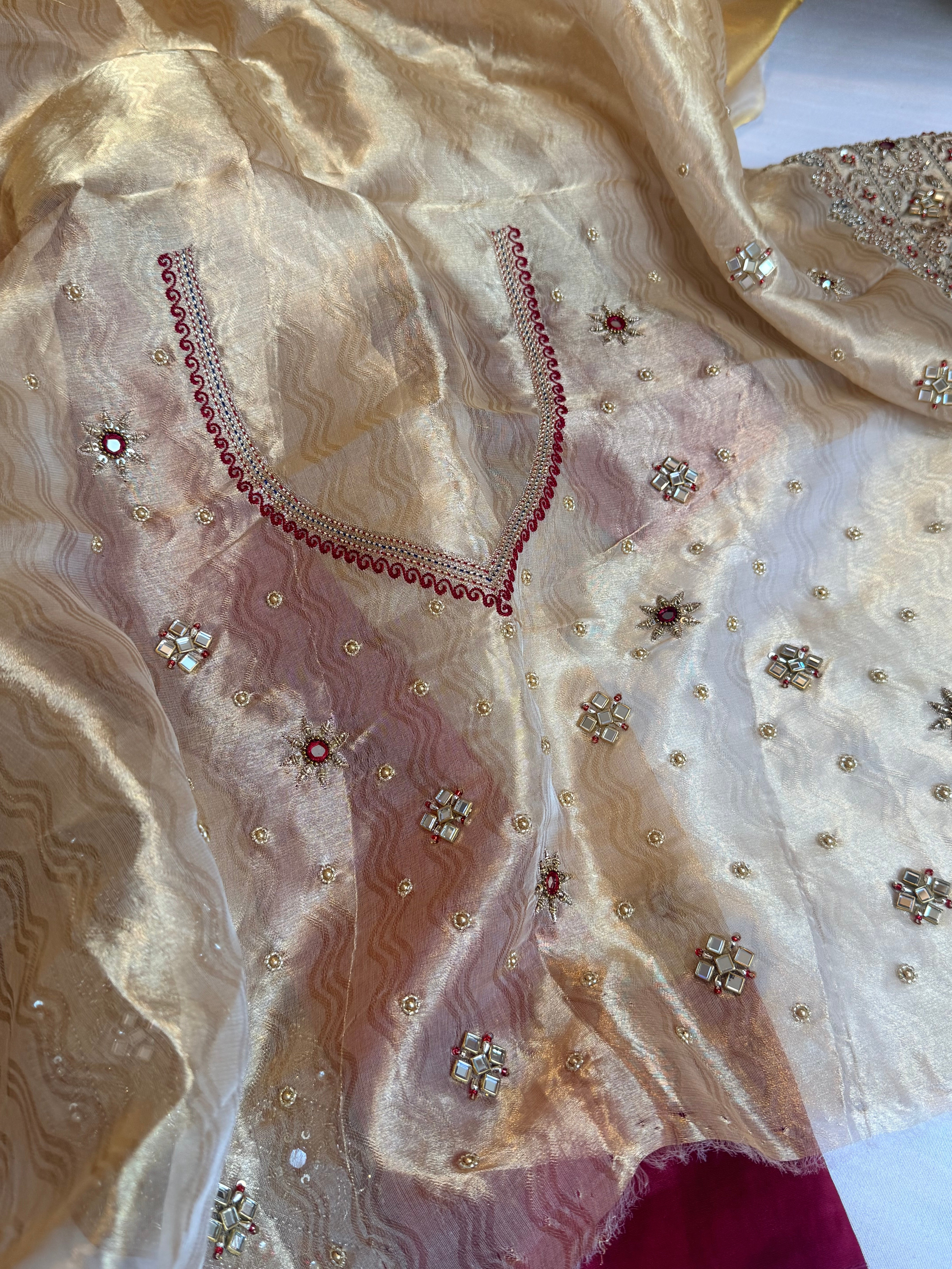 Zardozi & Jadauwork border tissue silk hand embroidered kadhwa butter gold saree
