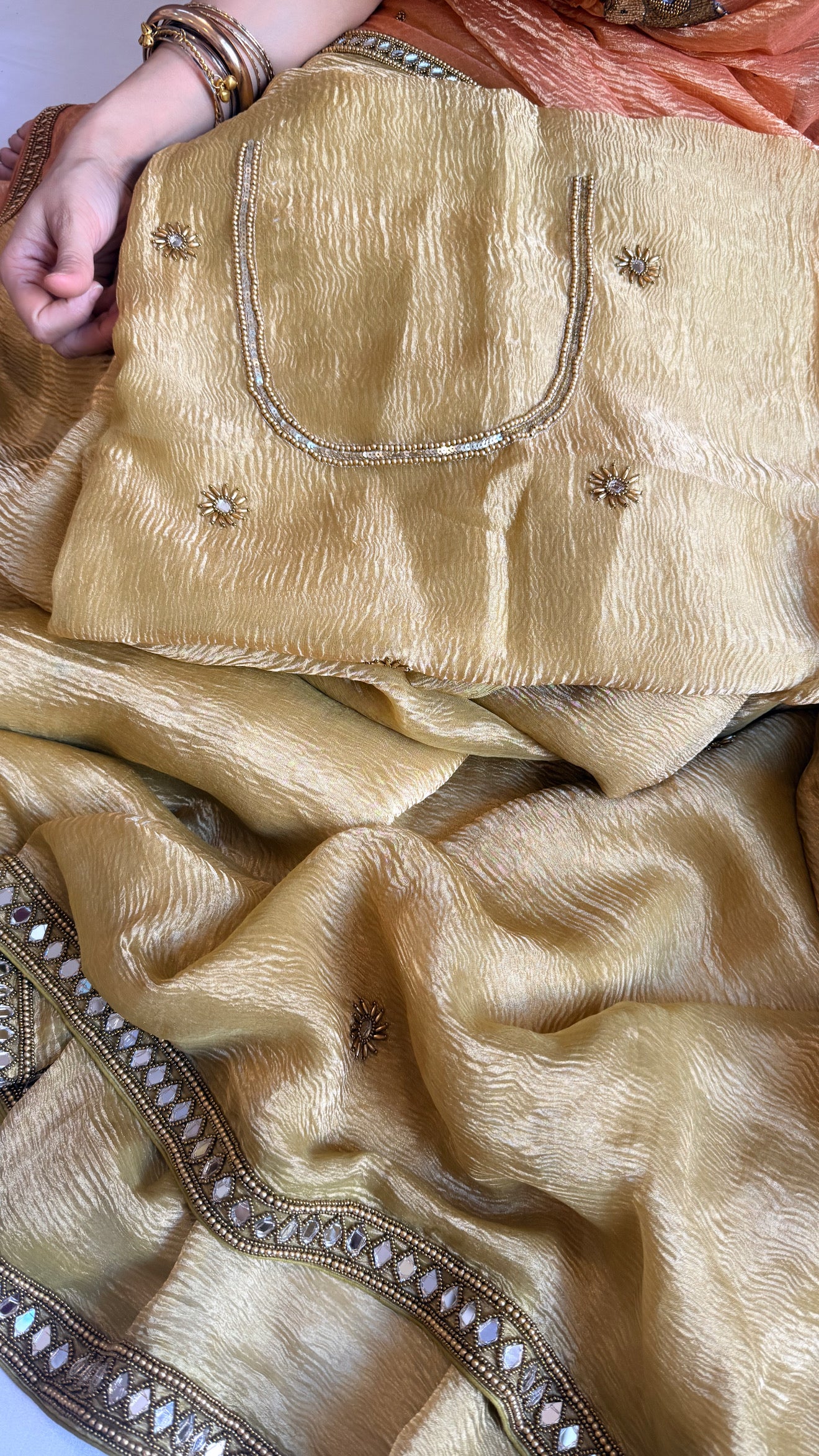 Mirrorwork edit mustard gold crushed tissue silk hand embroidered saree