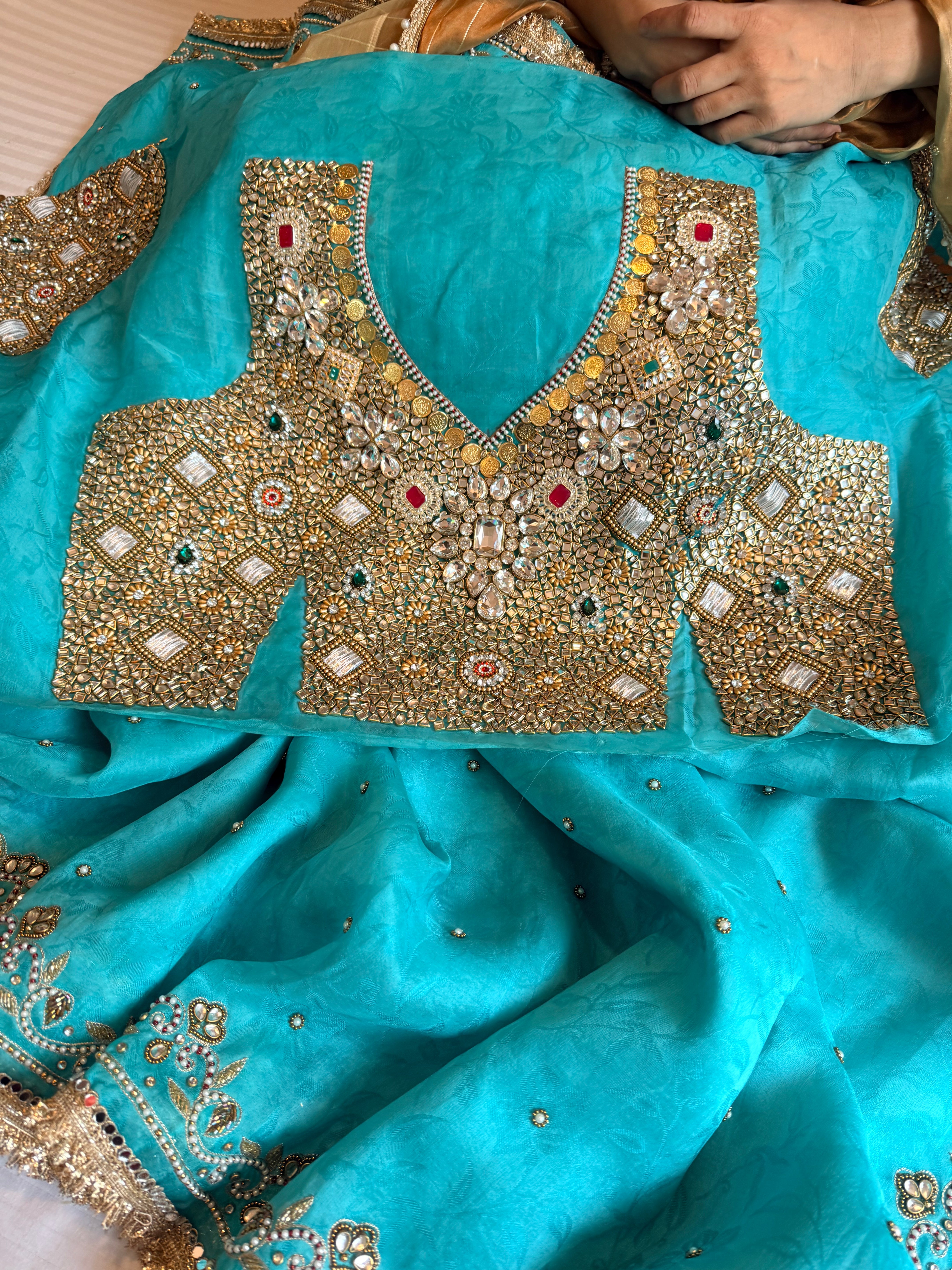 Jadauwork tissue tanchoi silk hand embroidered kadhwa saree