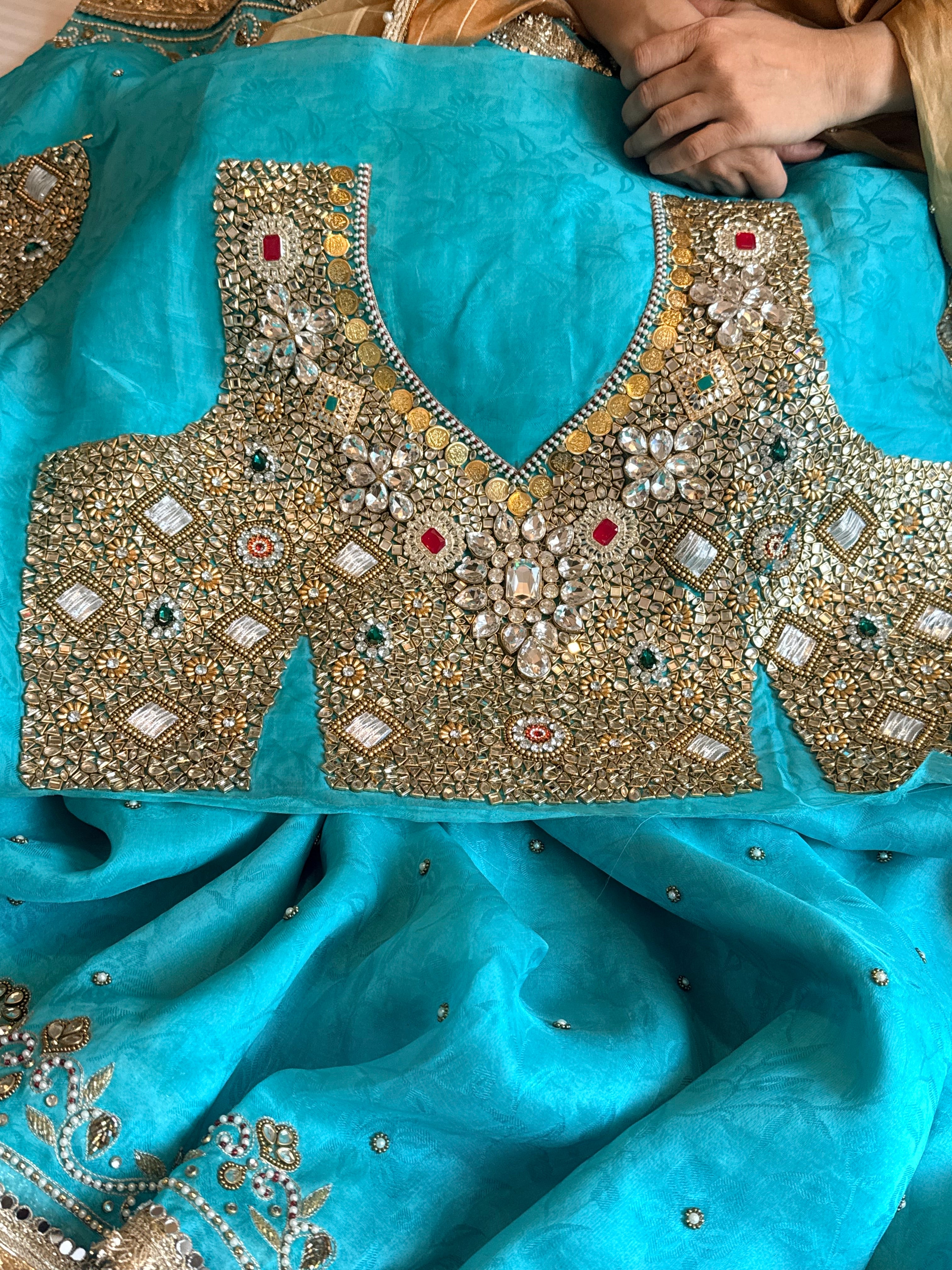 Jadauwork tissue tanchoi silk hand embroidered kadhwa saree