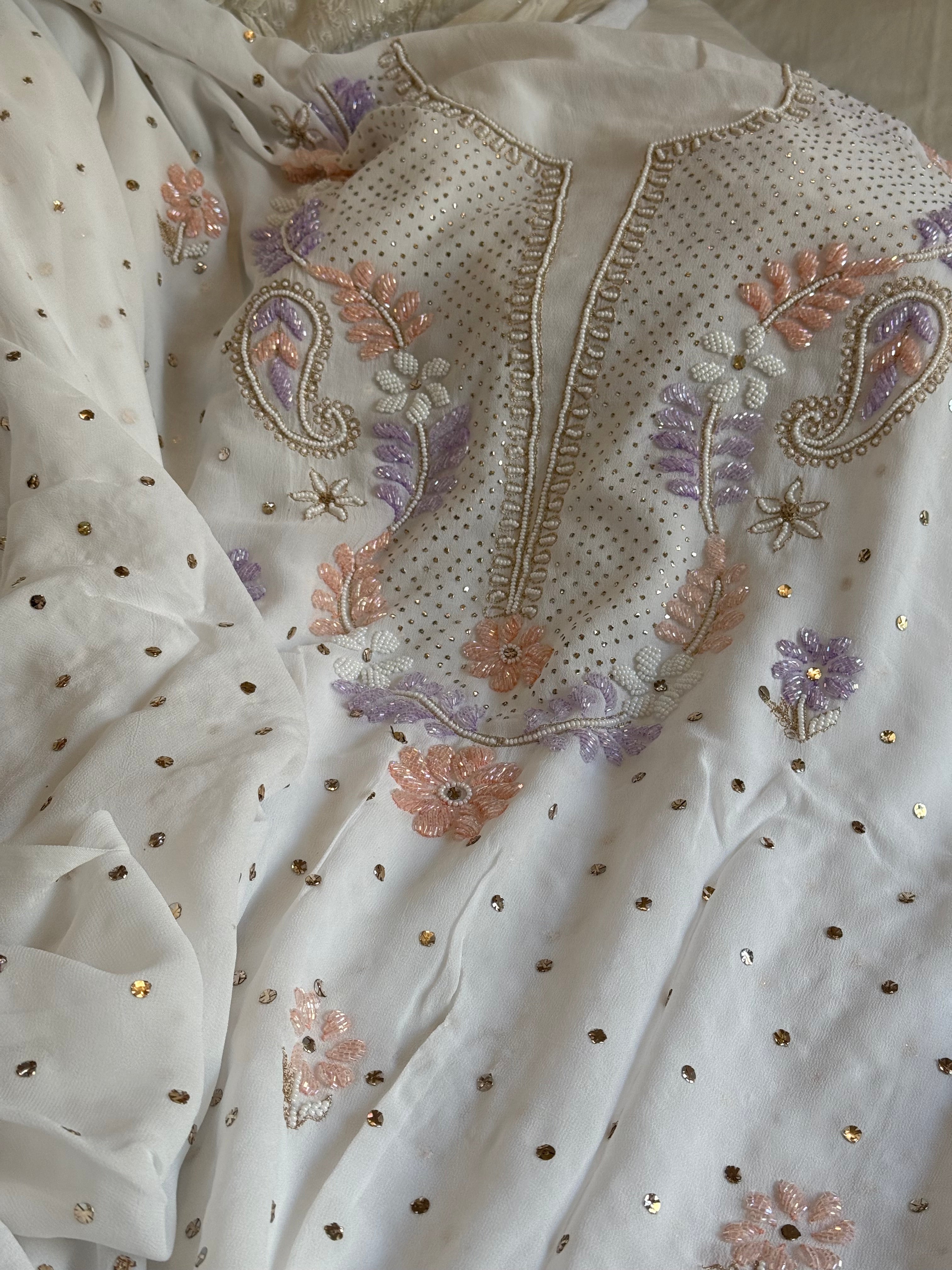 Banarasi gorgette mukaish and pearlwork hand embroidered kadhwa suits