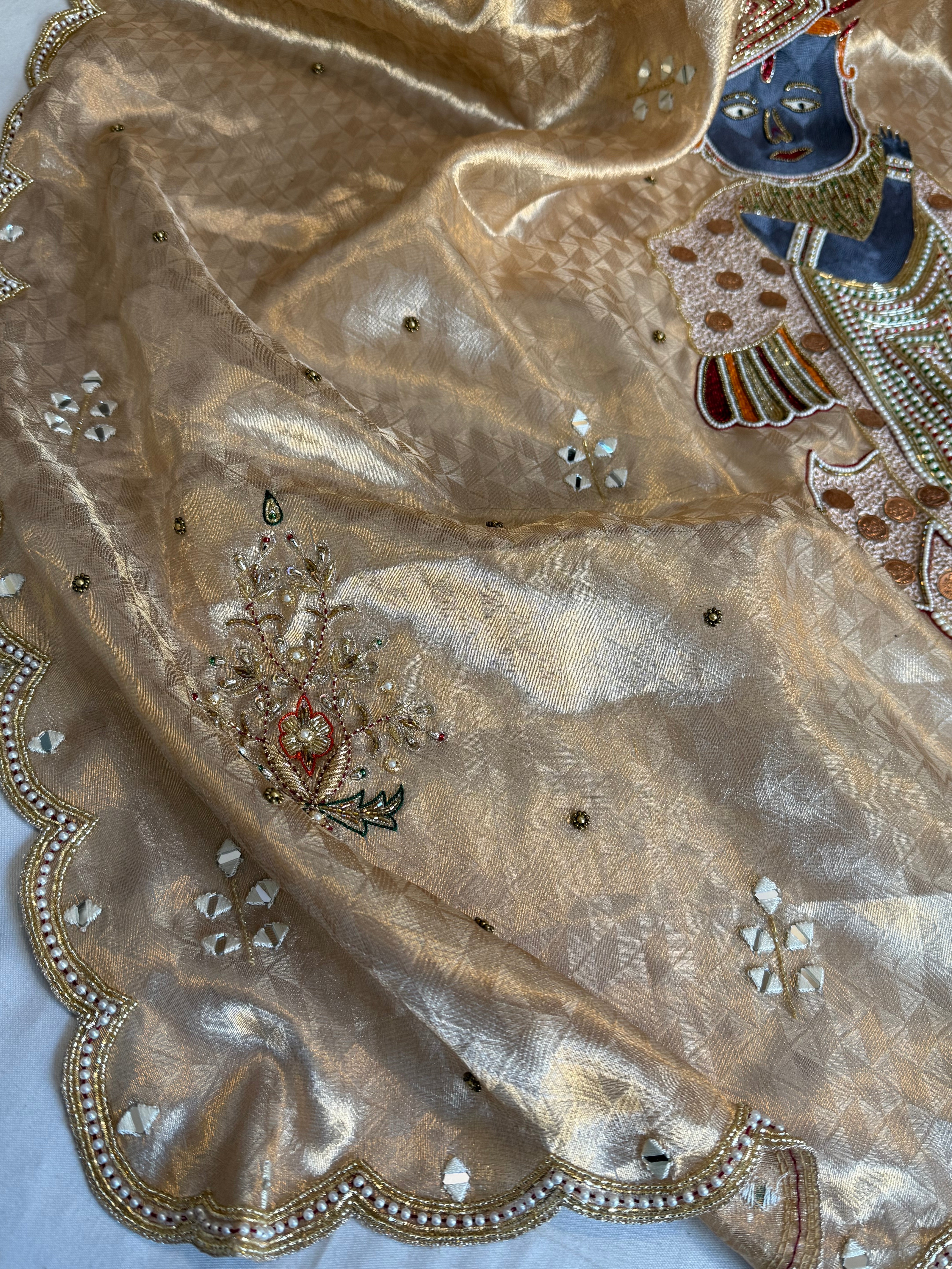 Shrinathji motif inspired molten tissue brocade kadhwa weaving hand embroidered saree