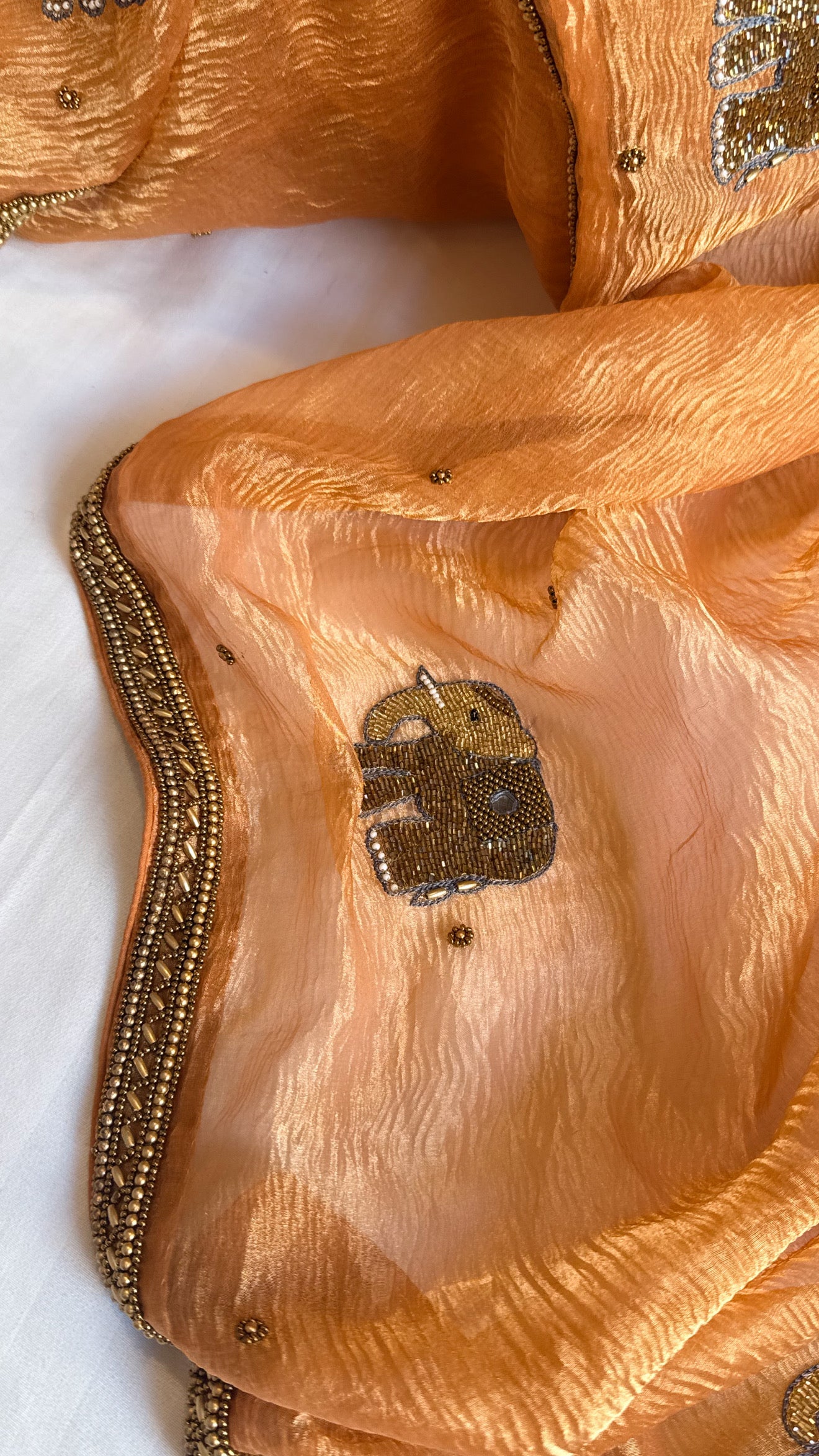 Mirrorwork edit gajri peach crushed tissue silk hand embroidered saree