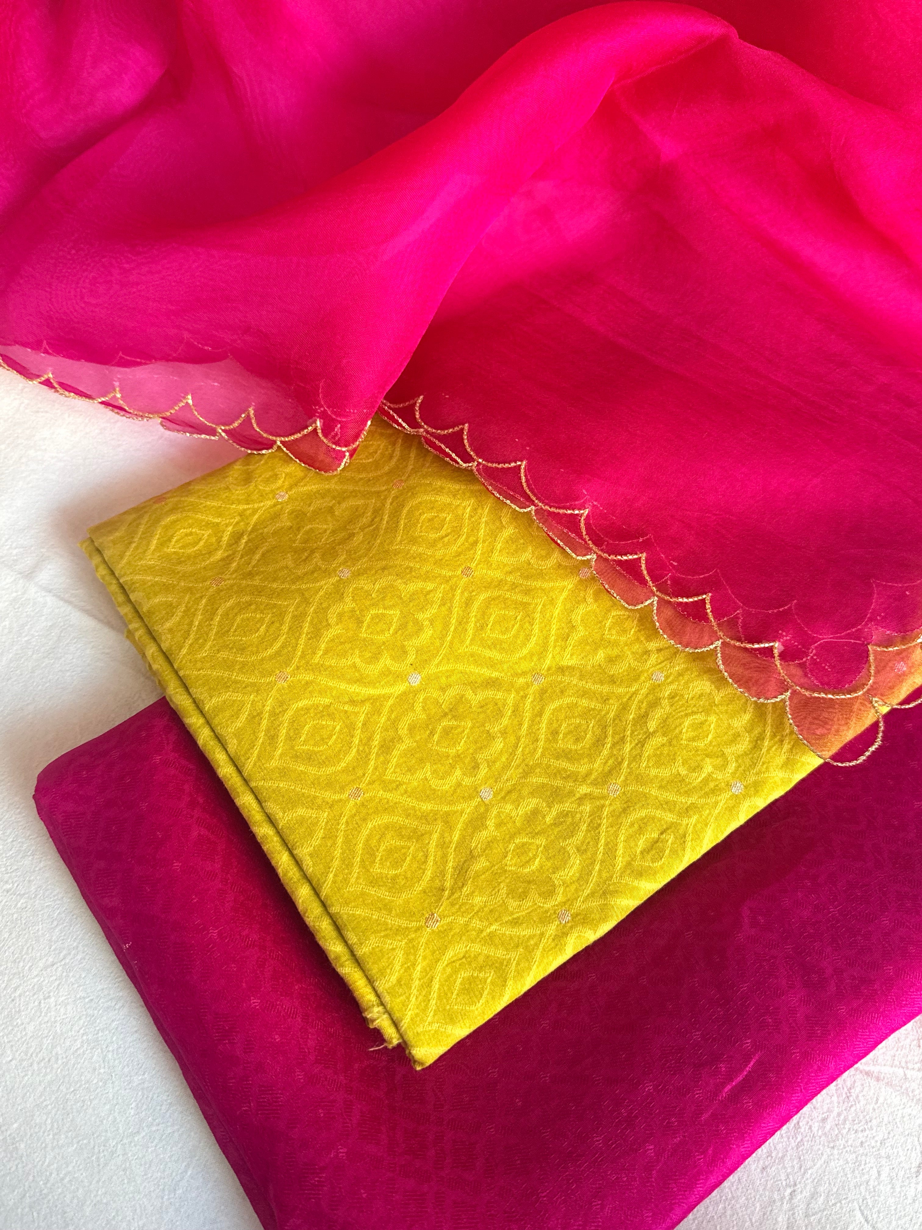 Summer suits under 8k - Mul cotton yellow kurta paired with rani scalloped kora silk duppata
