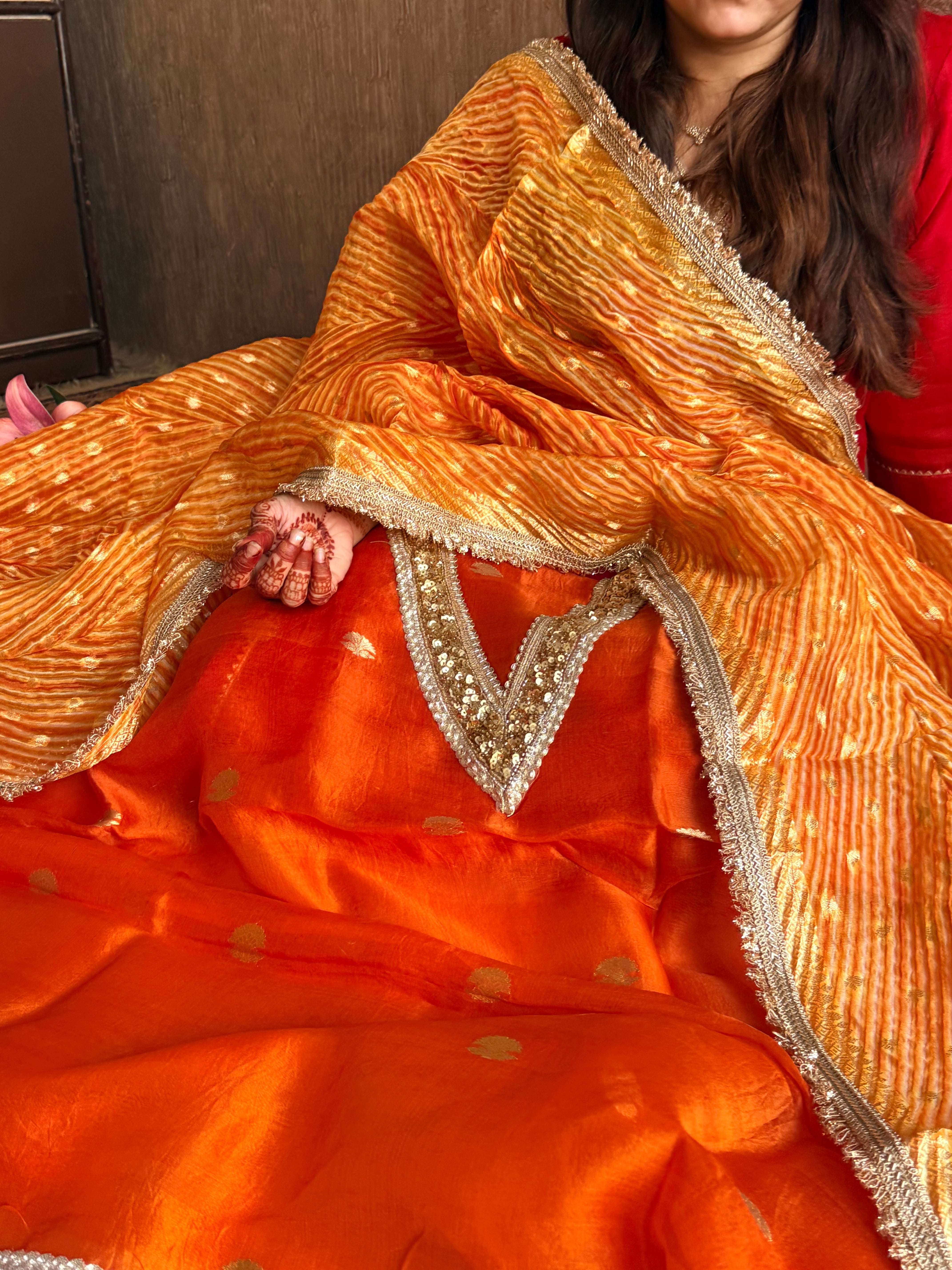 Arshi dye fanta orange sequin work hand embroidered saree