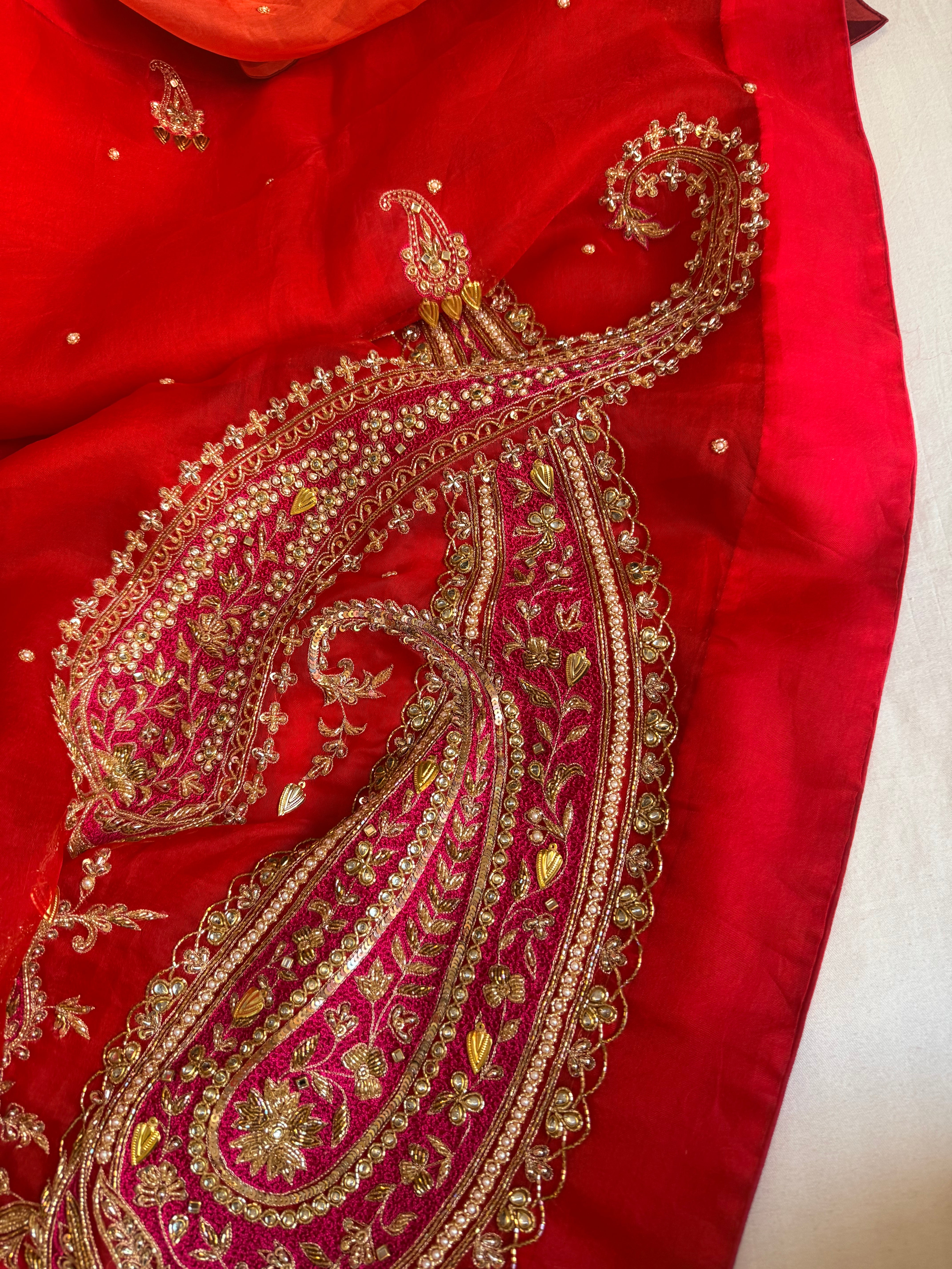 Traditional carry motif - rani and red combination kora silk hand embroidered saree
