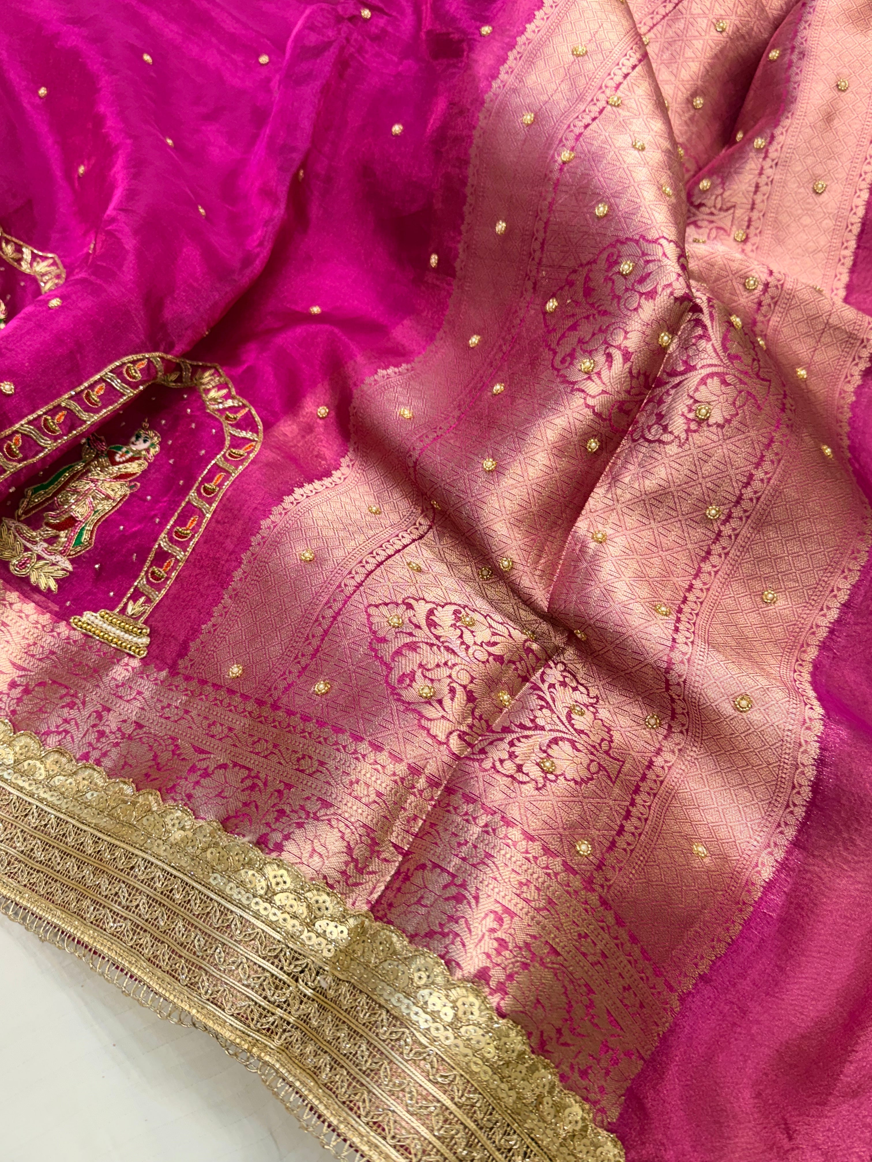 Rani pink husn tissue silk krishna motif hand embroidered saree