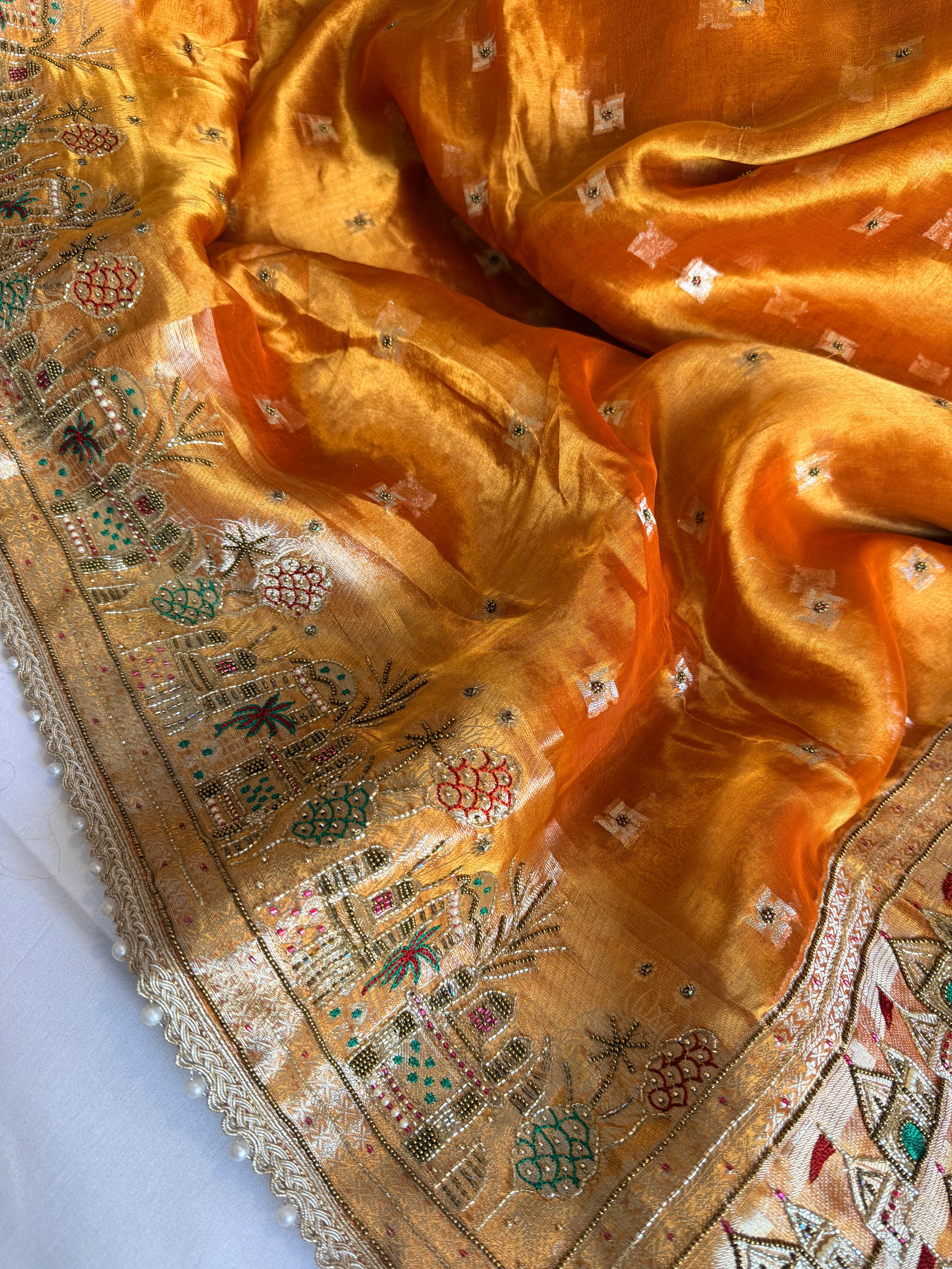 Ganga-darshan edit - Tissue silk kanjivaram orange hand embroidered kadhwa saree