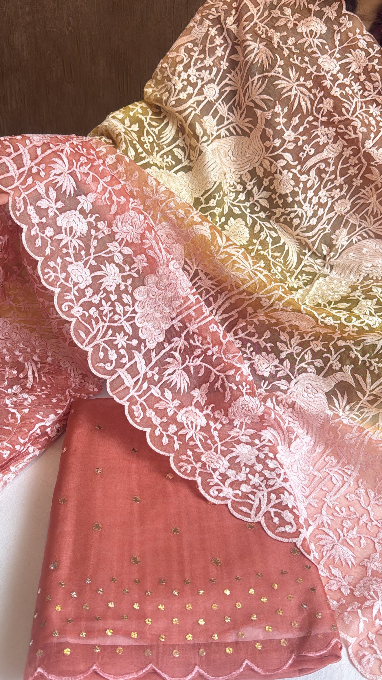 Shades of peach yellow - Parsi gara kora silk resham and mukaish work hand embroidered suits