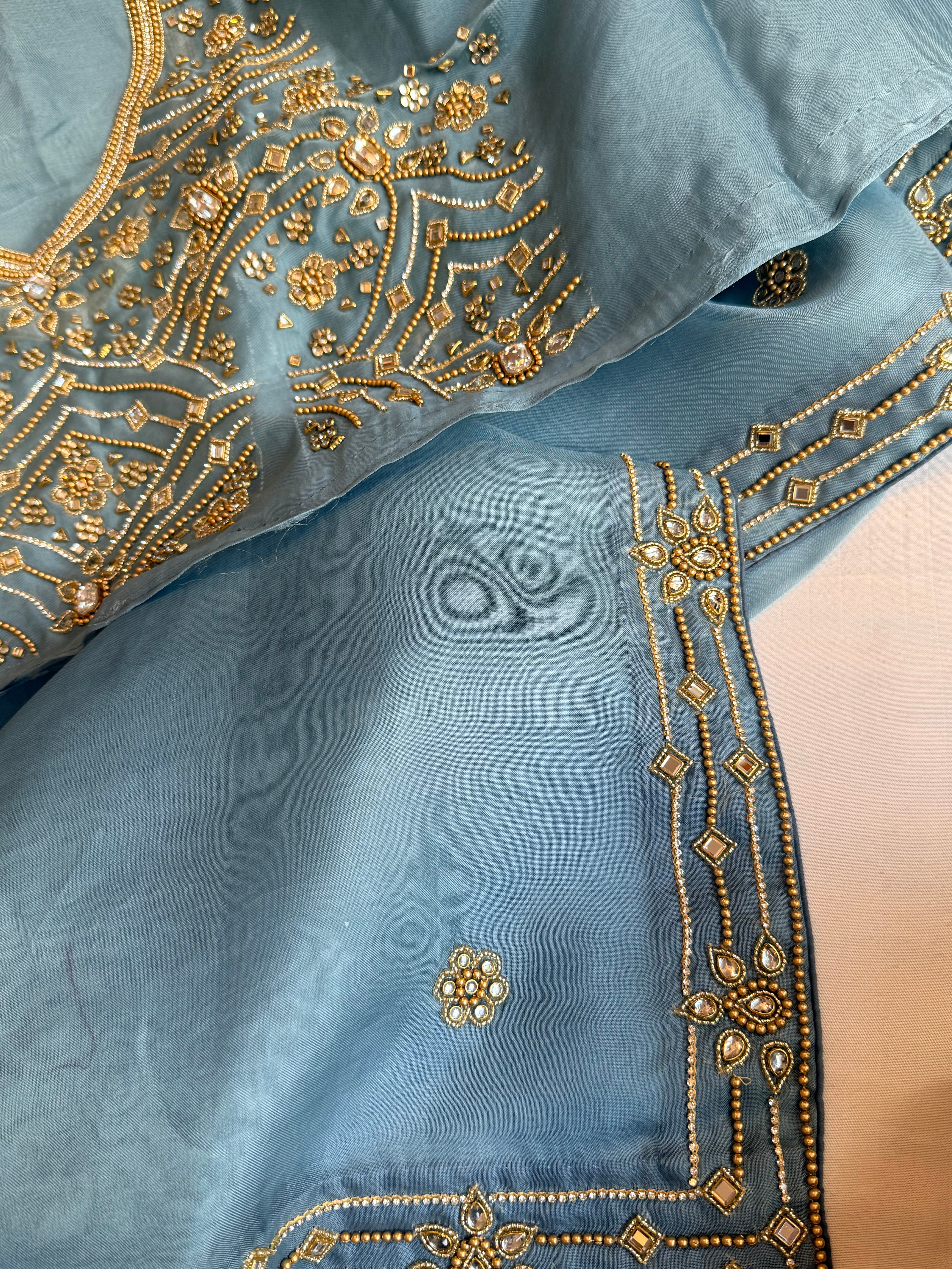 Banarasi icey blue kora silk polki hand embroidered kadhwa saree