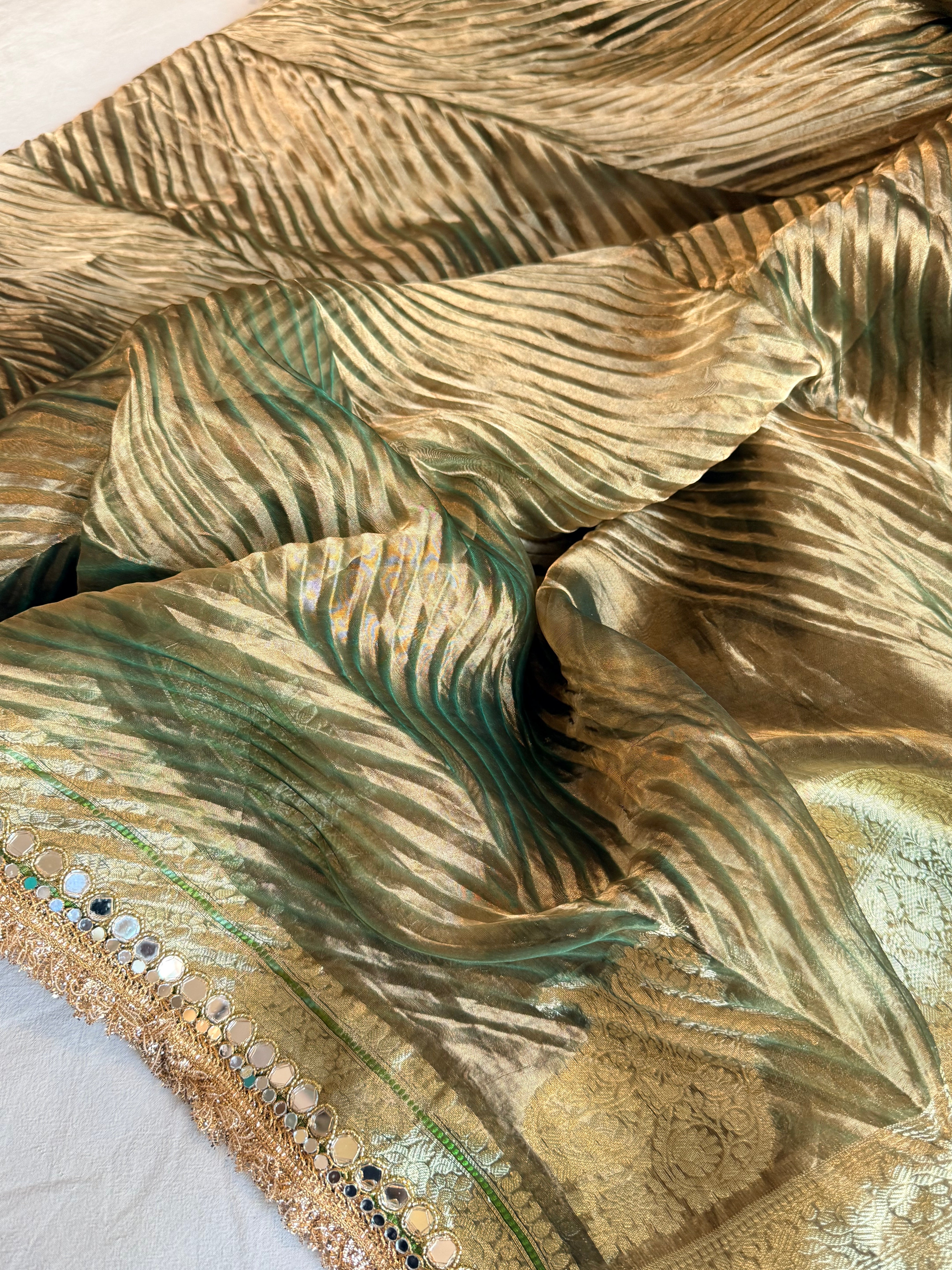 Mint green tissue silk arshi dyed mirrorwork hand embroidered kadhwa saree