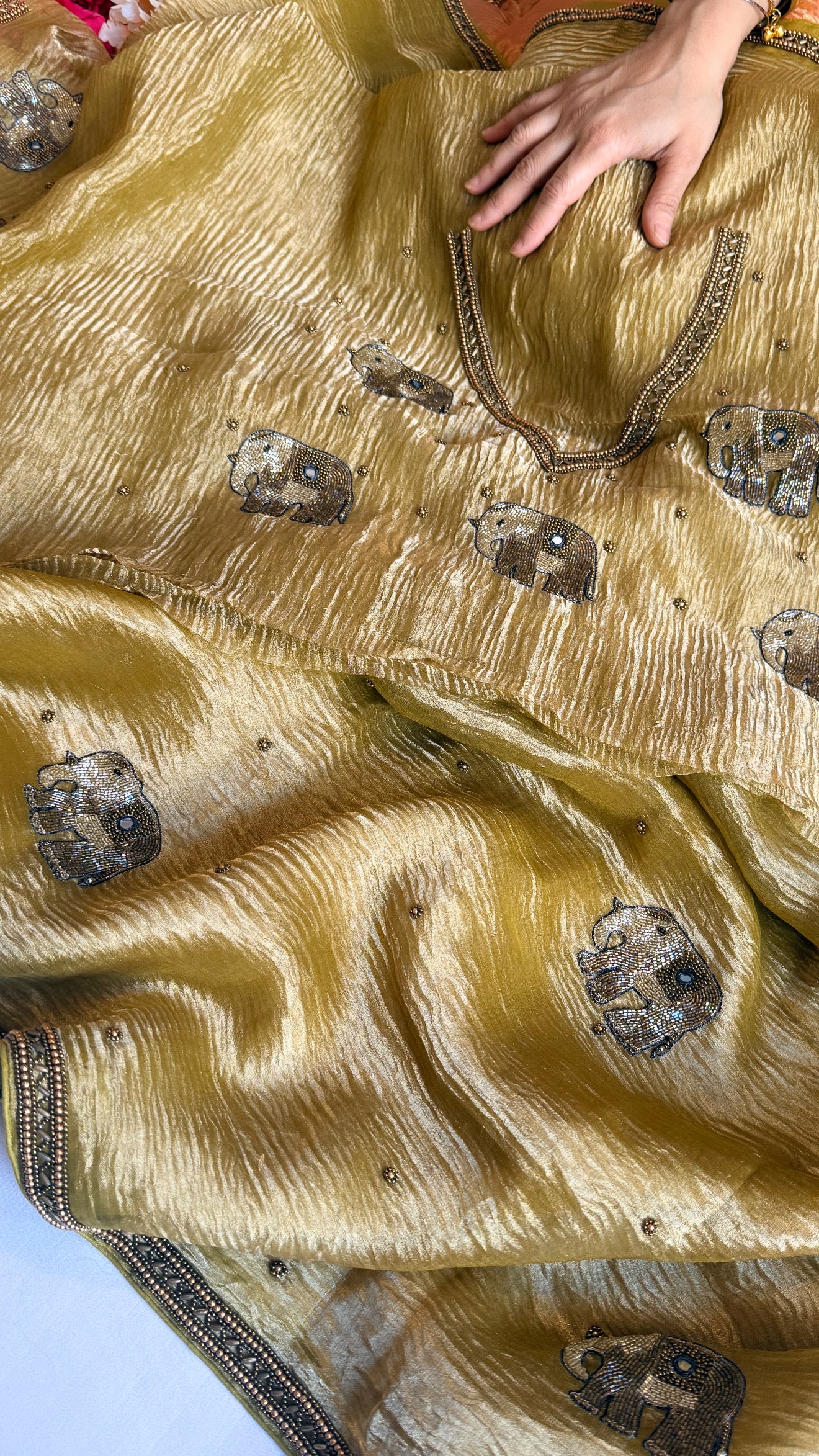 Mirrorwork edit lemon yellow crushed tissue silk hand embroidered saree