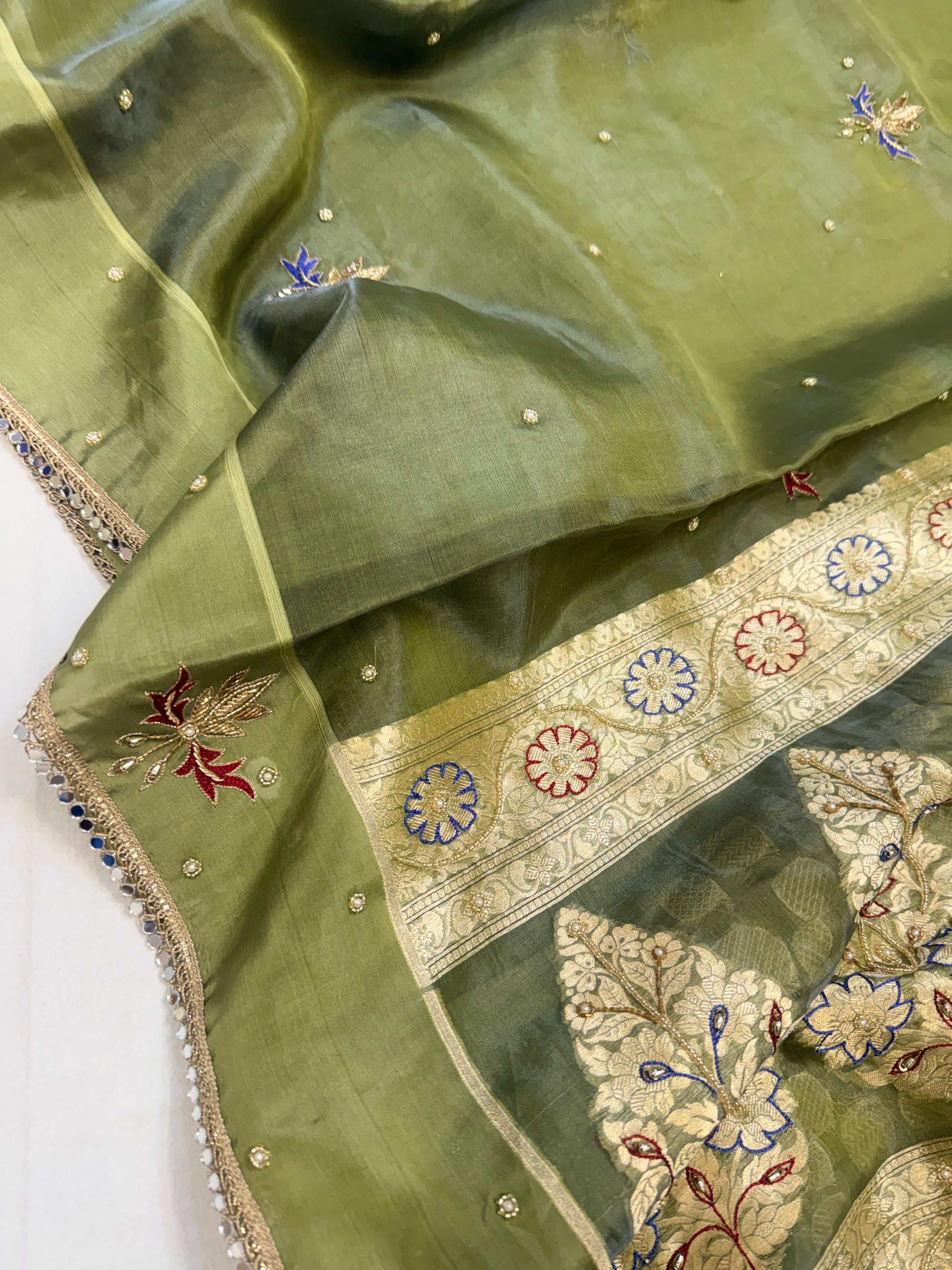 Parrot green tissue silk hand embroidered kadhwa saree