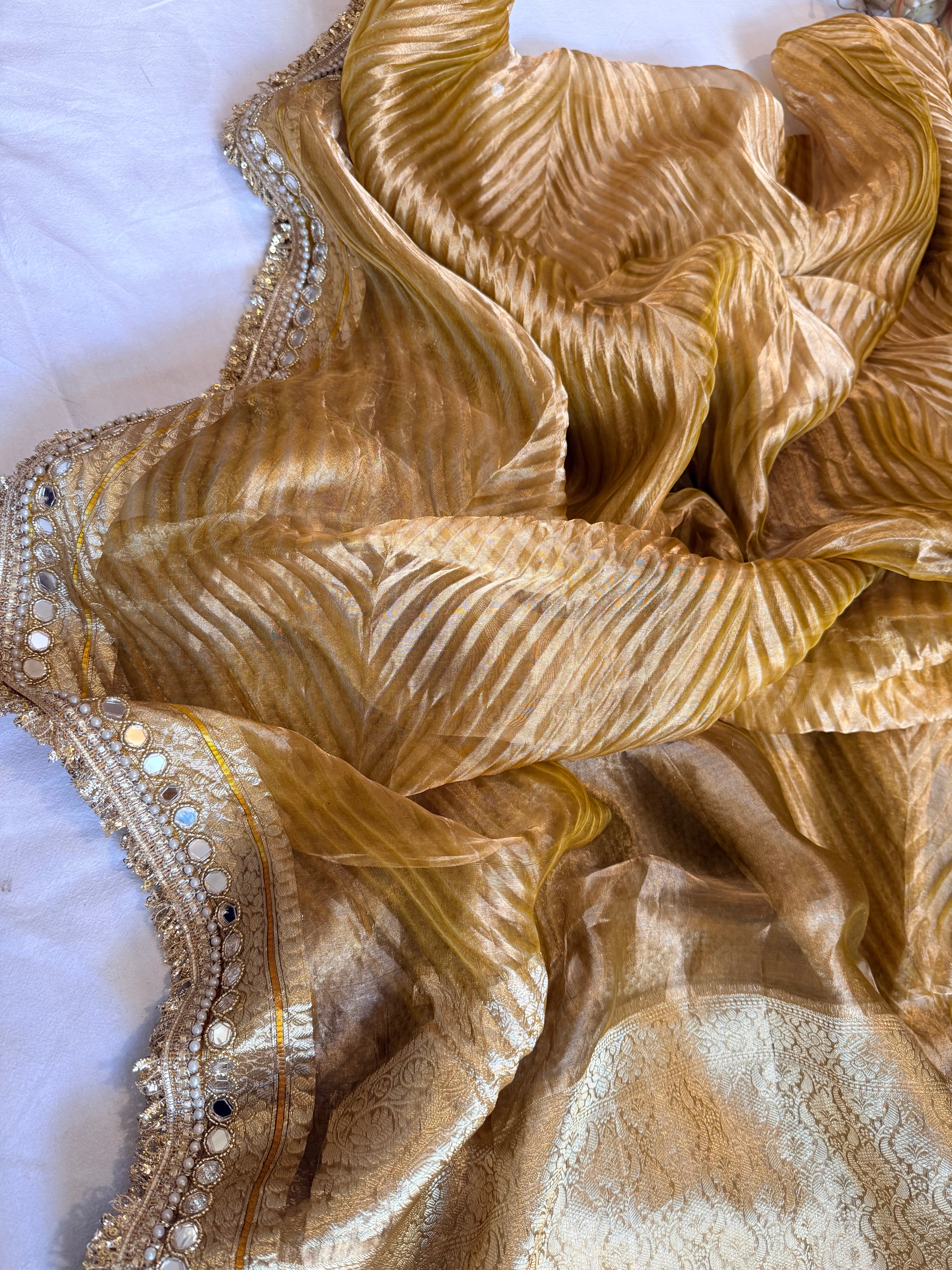 Yellow gold tissue silk arshi dyed mirrorwork hand embroidered kadhwa saree