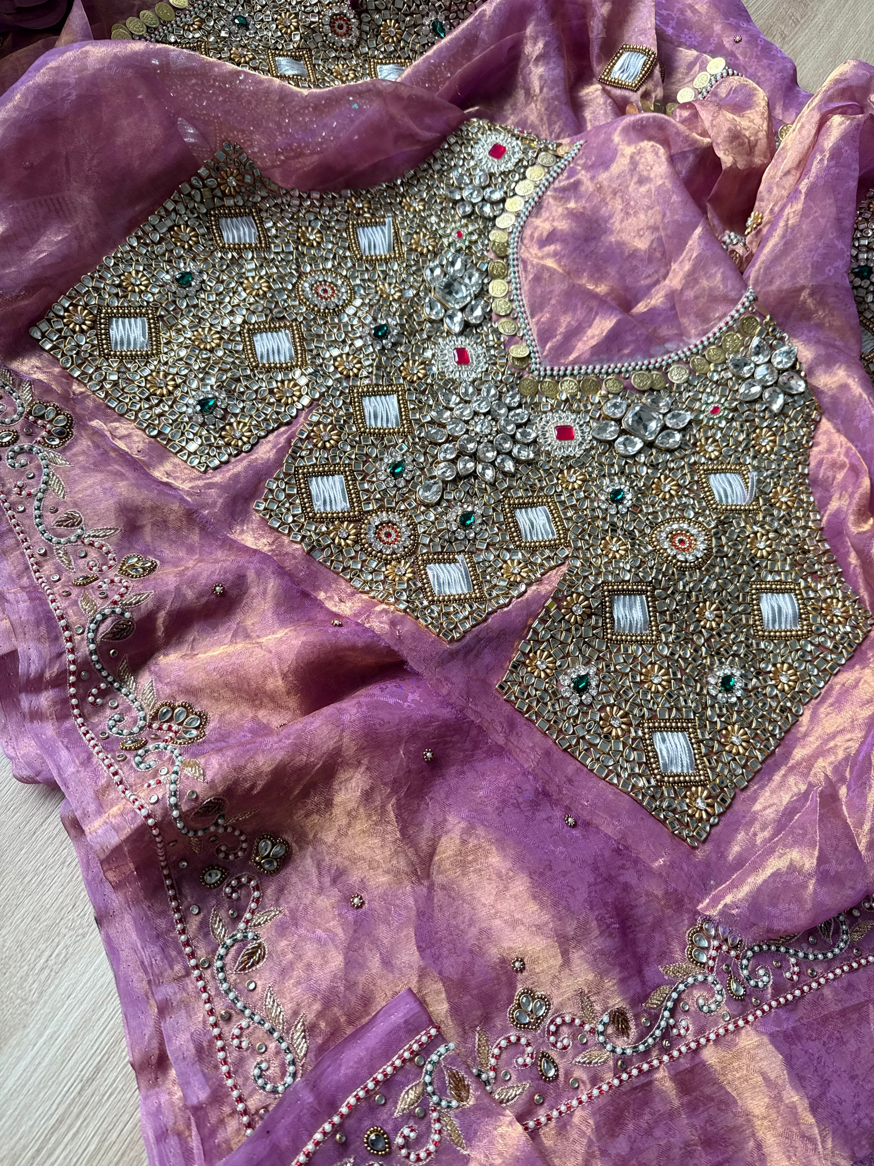 Jadauwork tissue tanchoi silk hand embroidered kadhwa saree