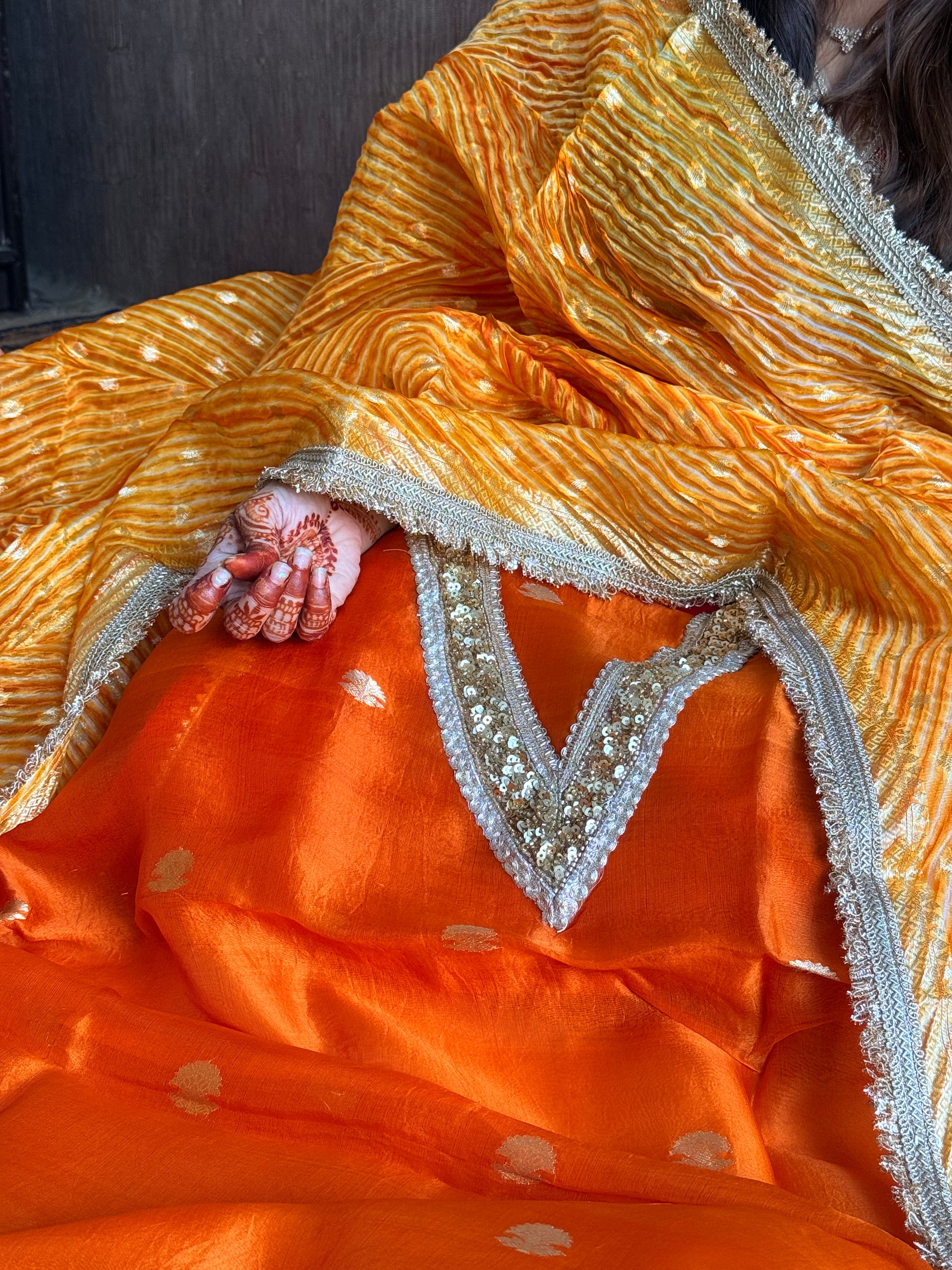 Arshi dye fanta orange sequin work hand embroidered saree