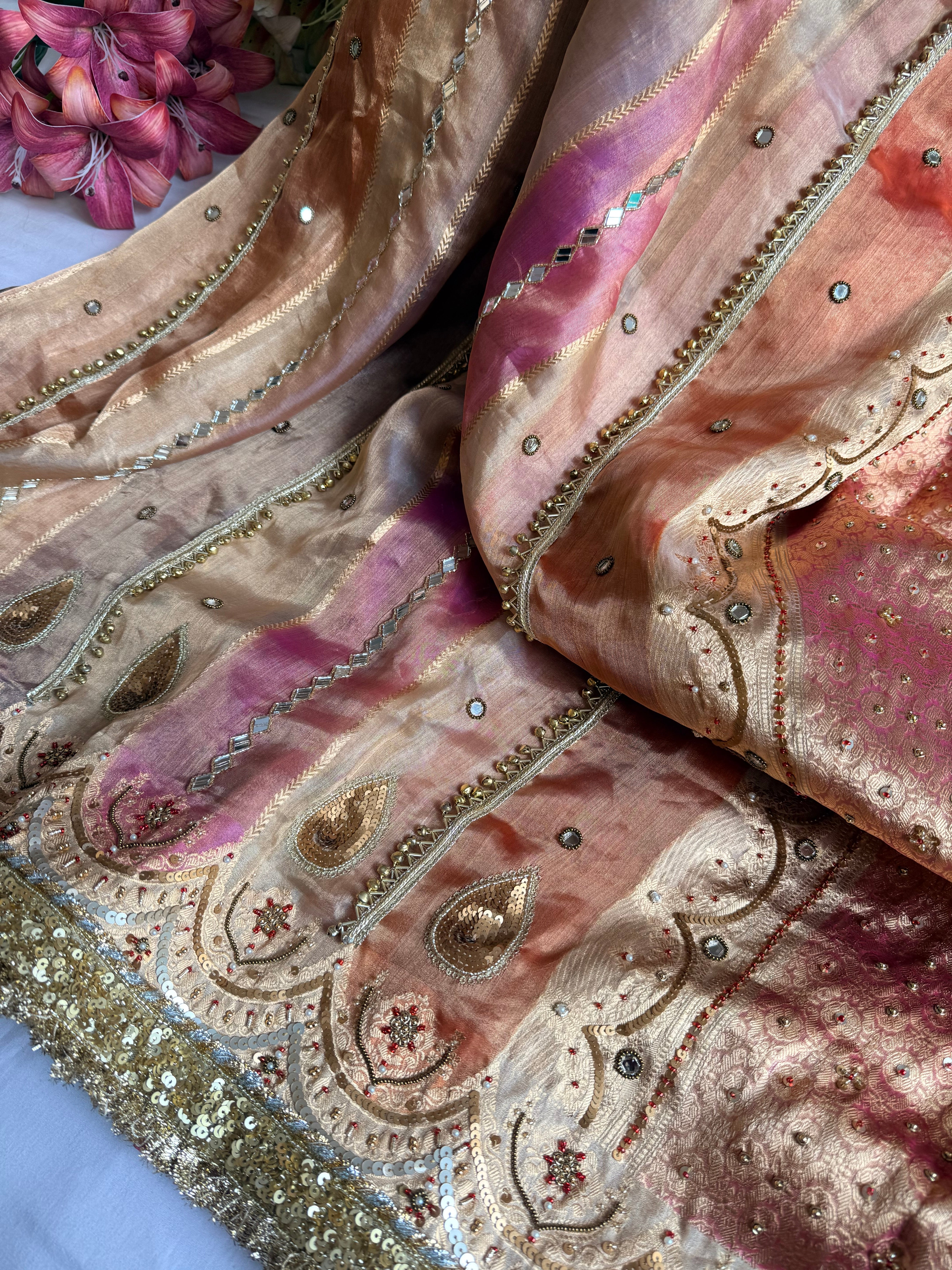 Navratan edit tissue silk rangkaat and ghungroo work hand embroidered saree
