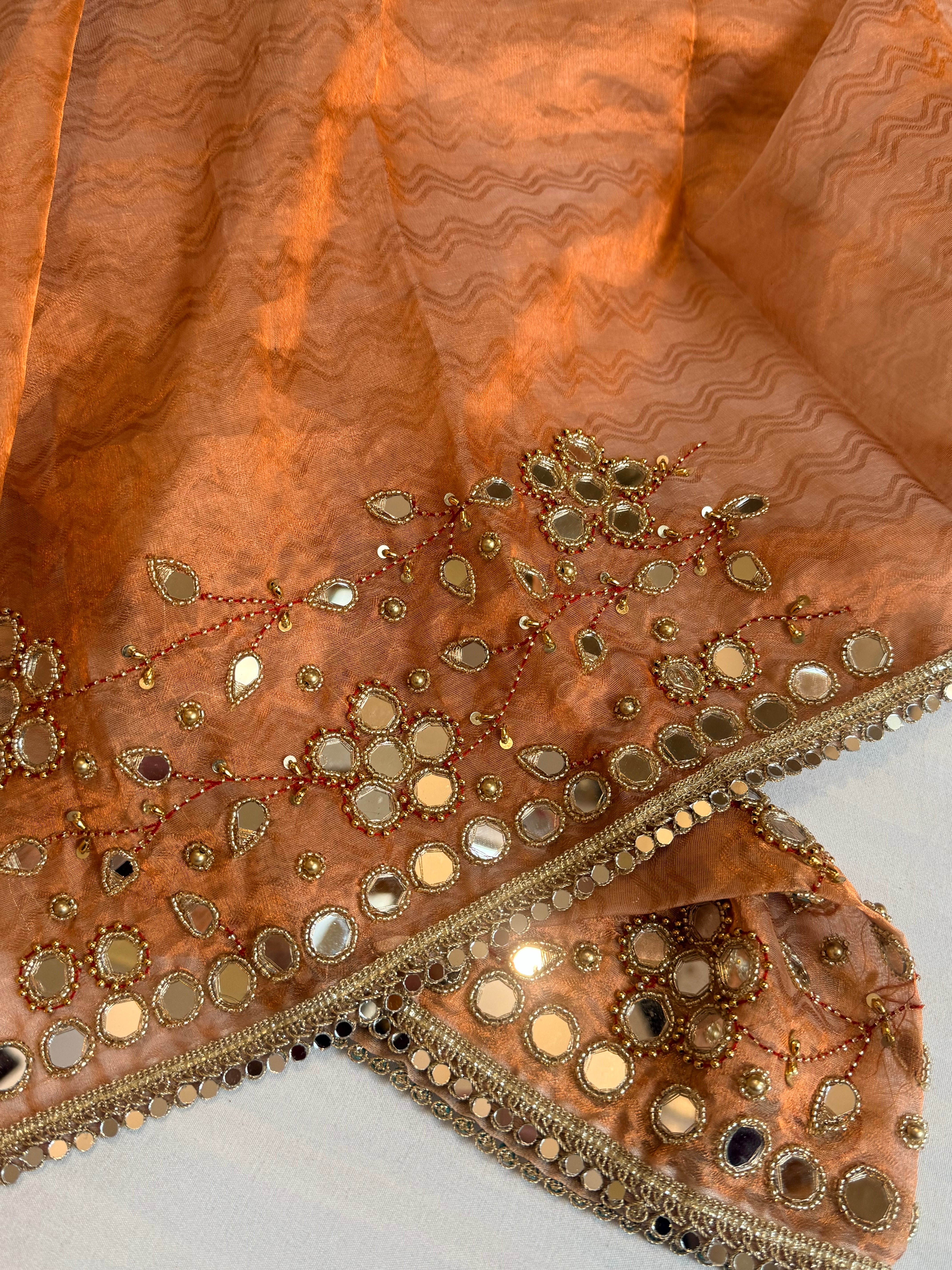 Mirrorwork & Jadauwork border tissue silk hand embroidered kadhwa copper saree