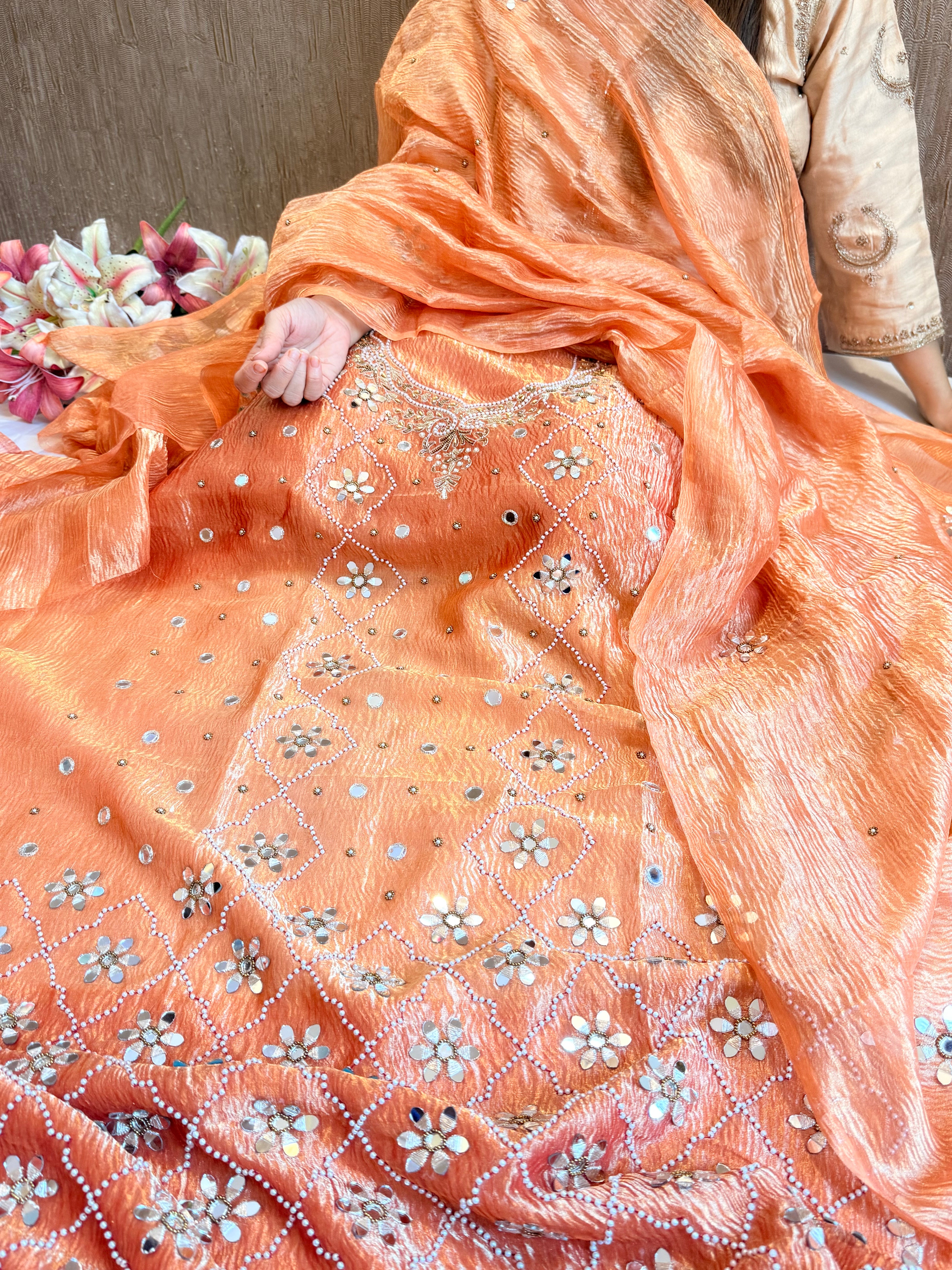 Peachy orange crush tissue silk mirrorwork hand embroidered kadhwa suits