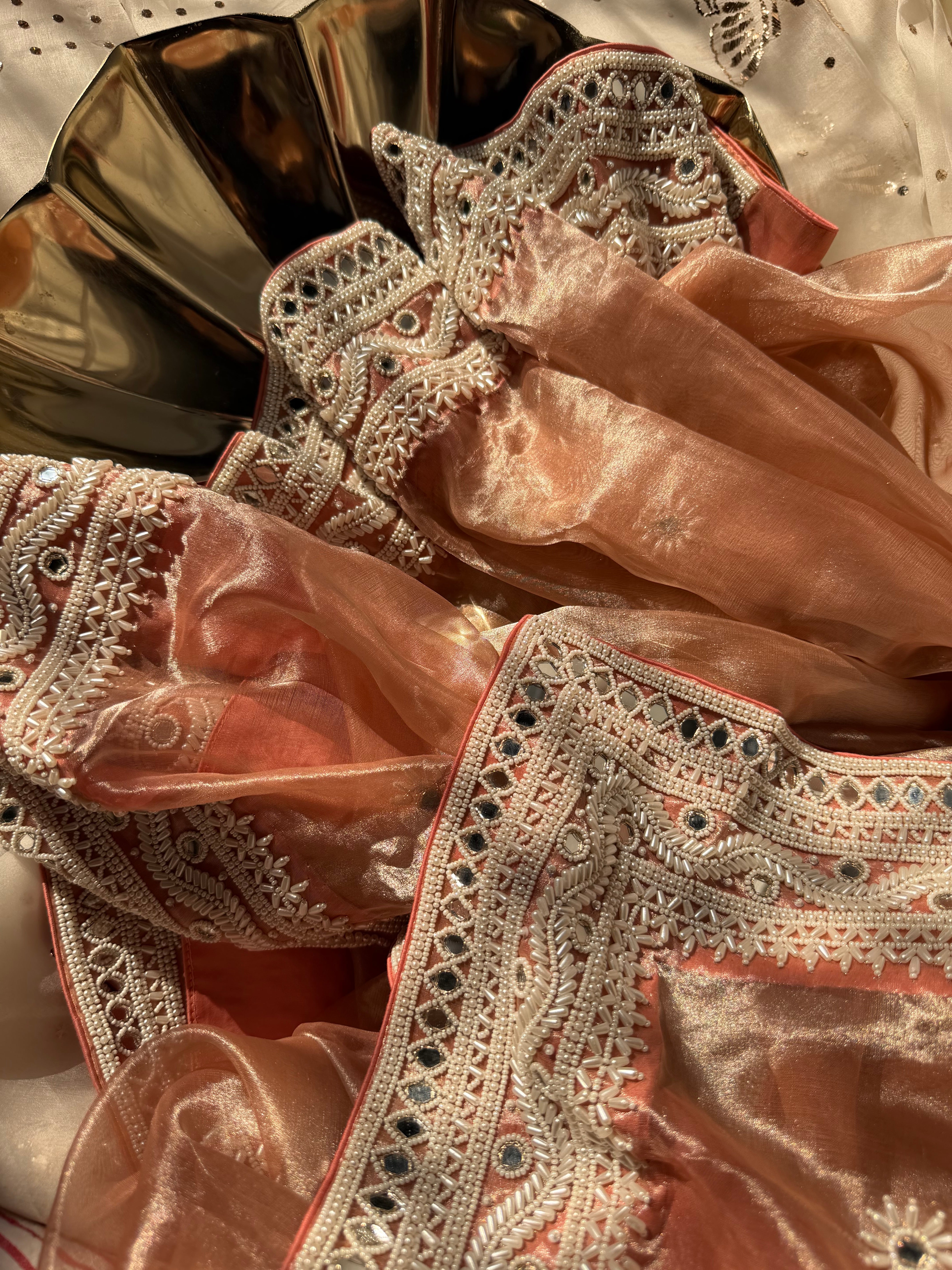 Gajri peach mirrorwork and pearlwork hand embroidered diamond tissue saree