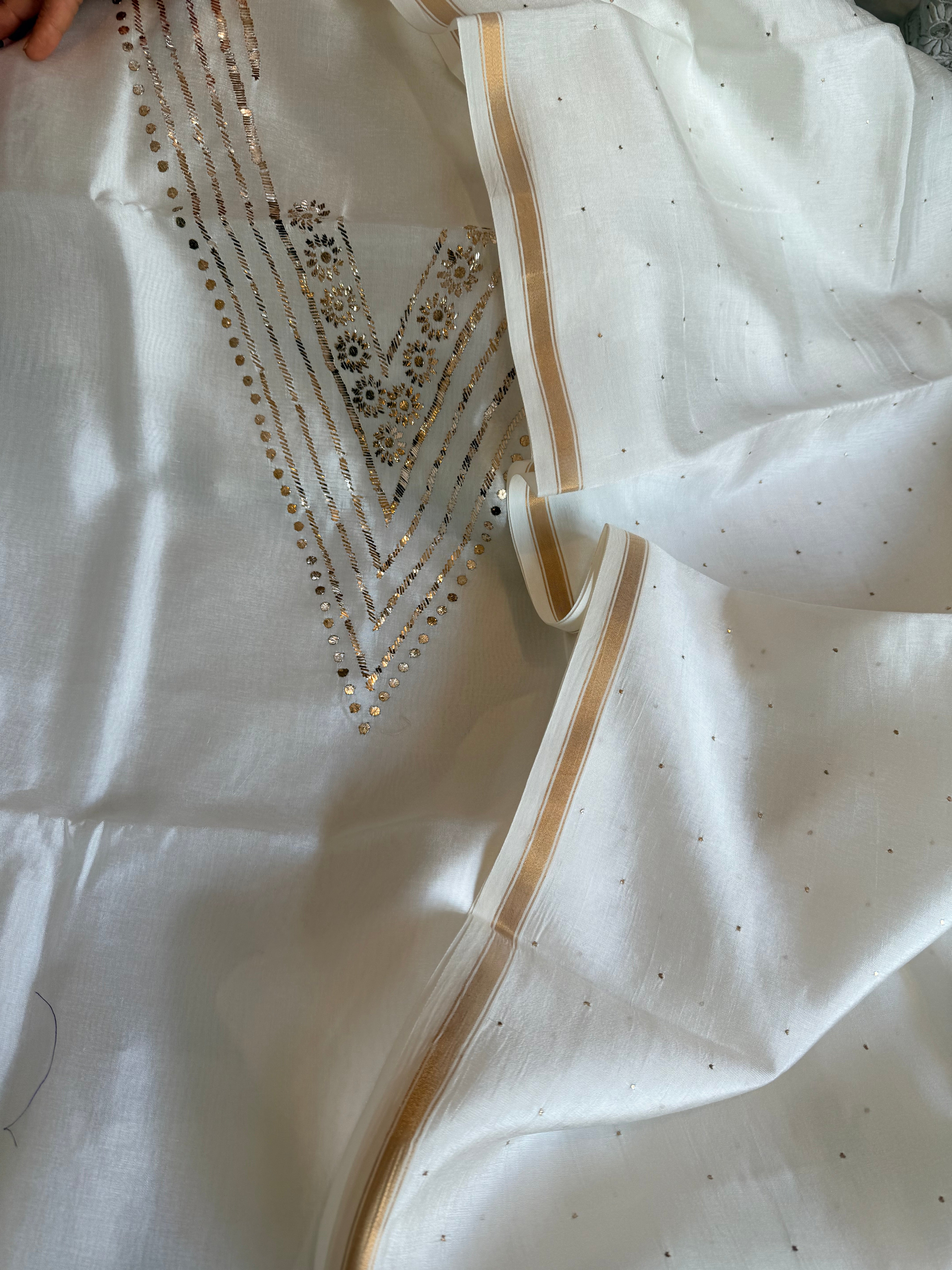Pearl white spun chiniya silk mukaish hand embroidered suit sets