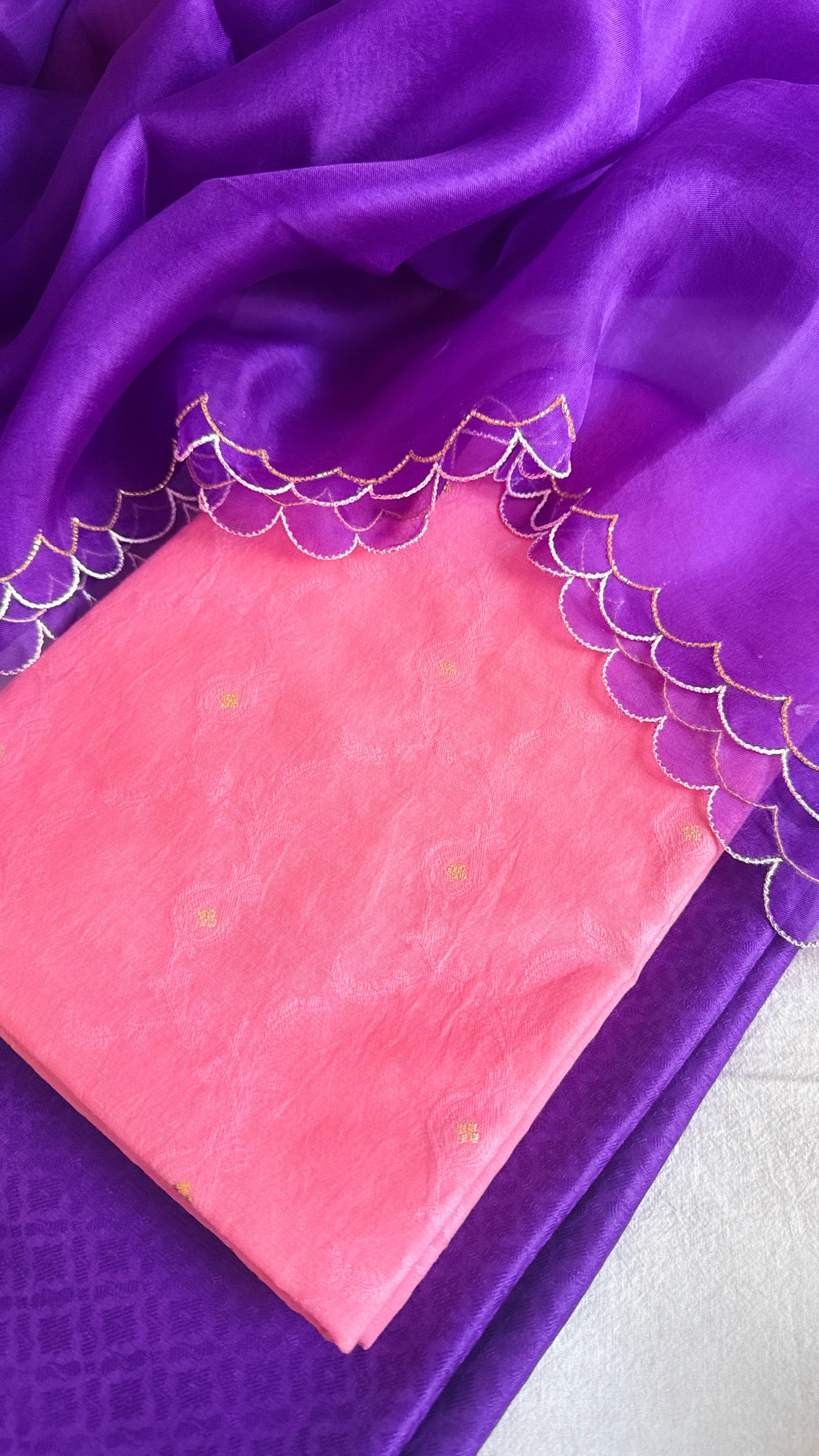 Summer suits under 8k - Mul cotton peach kurta paired with purple scalloped kora silk duppata